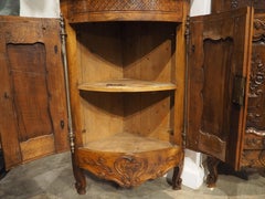 Pair of Sculpted Antique Walnut Corner Cabinets from Provence, France, C. 1900