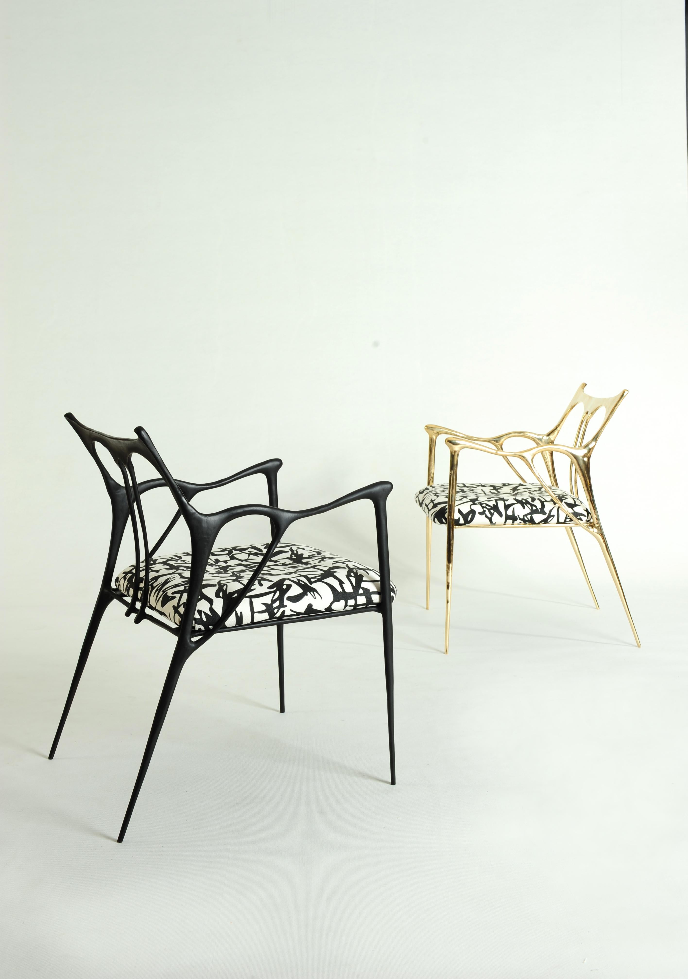 Pair of sculpted brass chairs, Misaya
Dimensions: W 54 x L 58 x H 79 cm (seating: 63)
Hand-sculpted chairs.
 
Misaya emulates Chinese ink paintings through the process of lost-wax casting.

Each piece in the Ink Collection, which consists of a