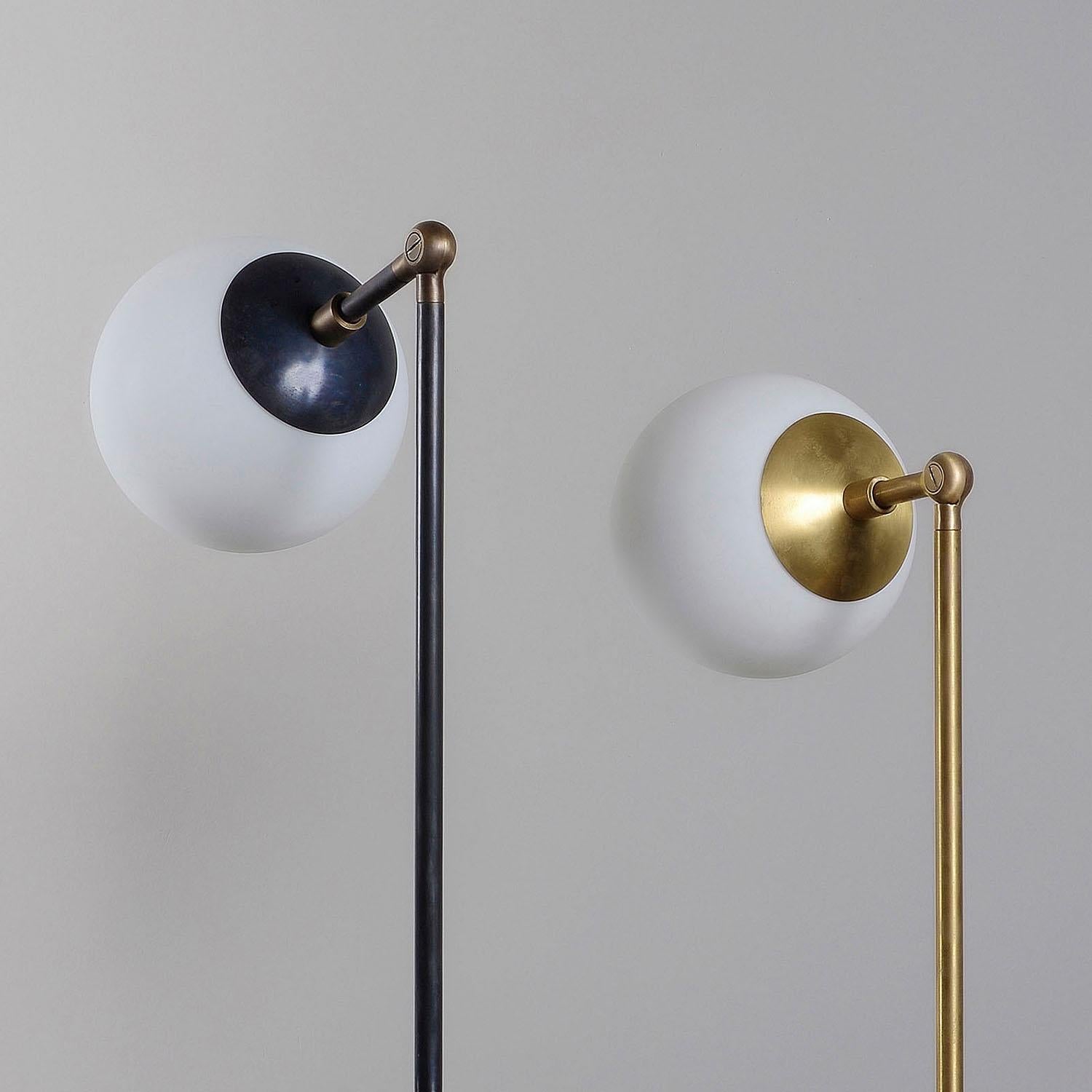 Contemporary Sculpted Brass & Glass Pendant, Tango One Globe by Paul Matter
Set of 2

Tango is born from playful experimentation with vintage lighting components.
Burnt, aged brass and etched glass are combined to create lighting fixtures that fuse