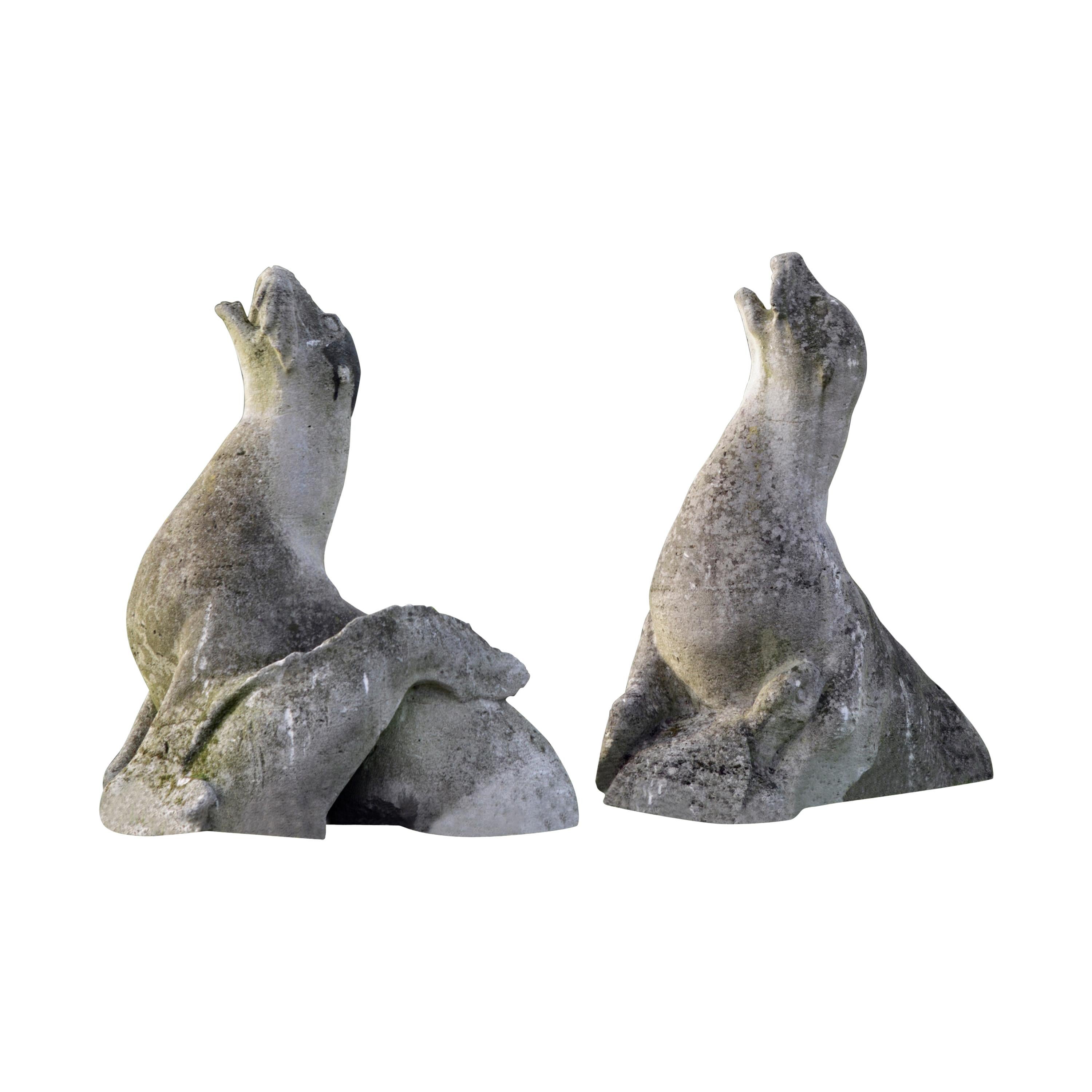 Pair of Sculpted Limestone Models of Seals