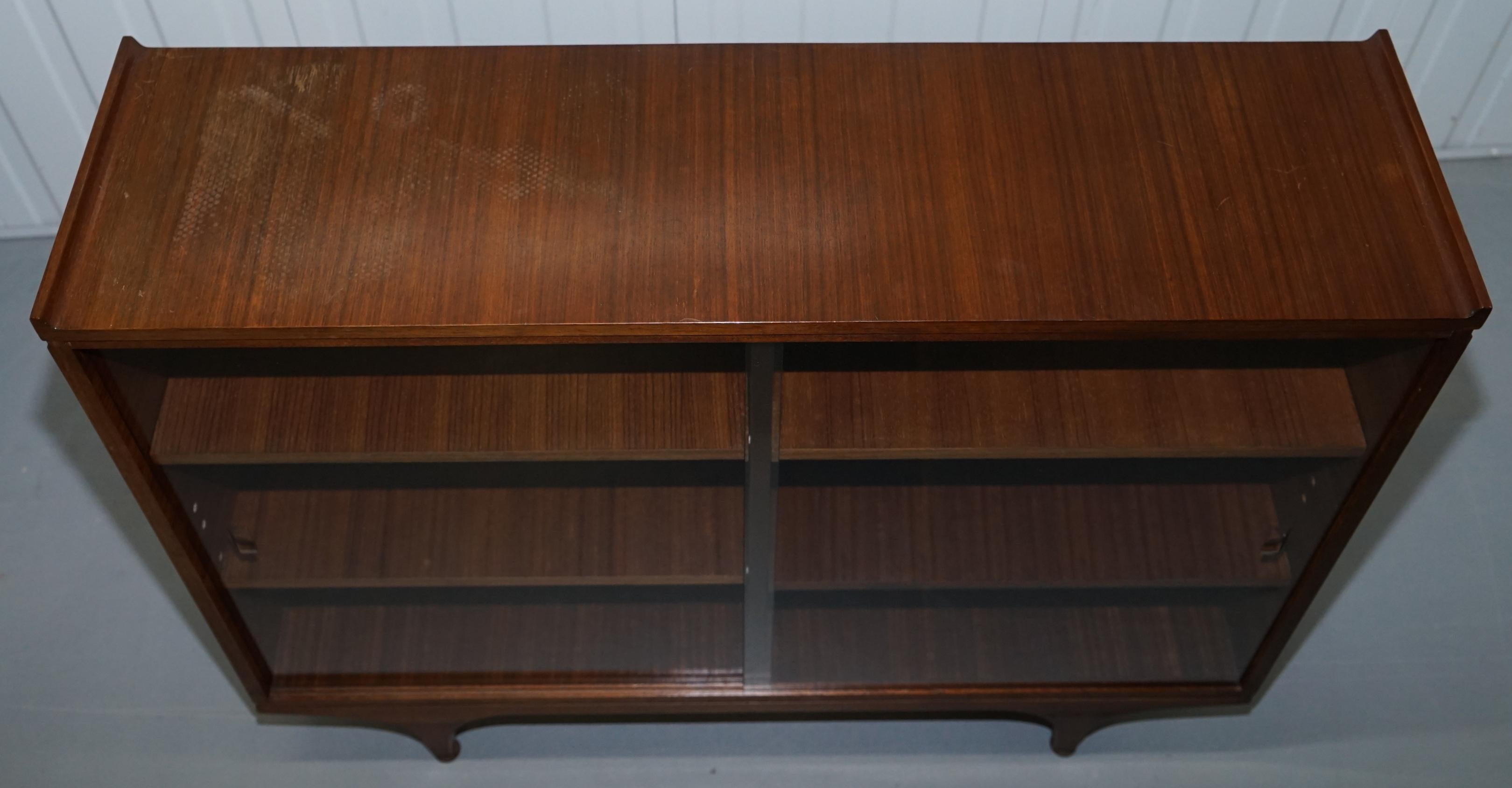 Pair of Sculpted Mid-Century Modern Teak Bookcases with Glass Sliding Doors 11