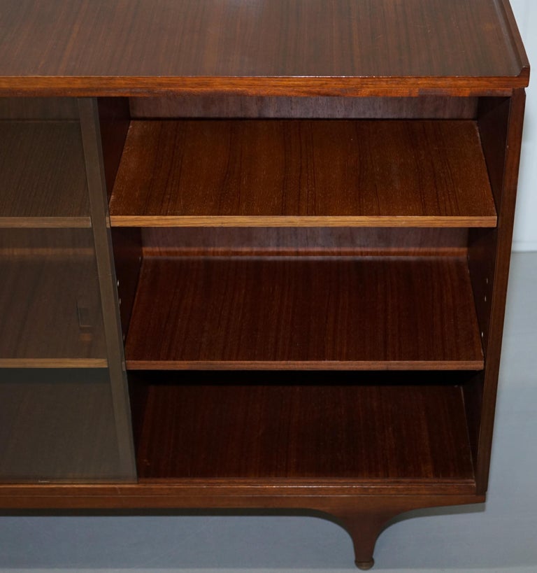 Pair of Sculpted MidCentury Modern Teak Bookcases with Glass Sliding