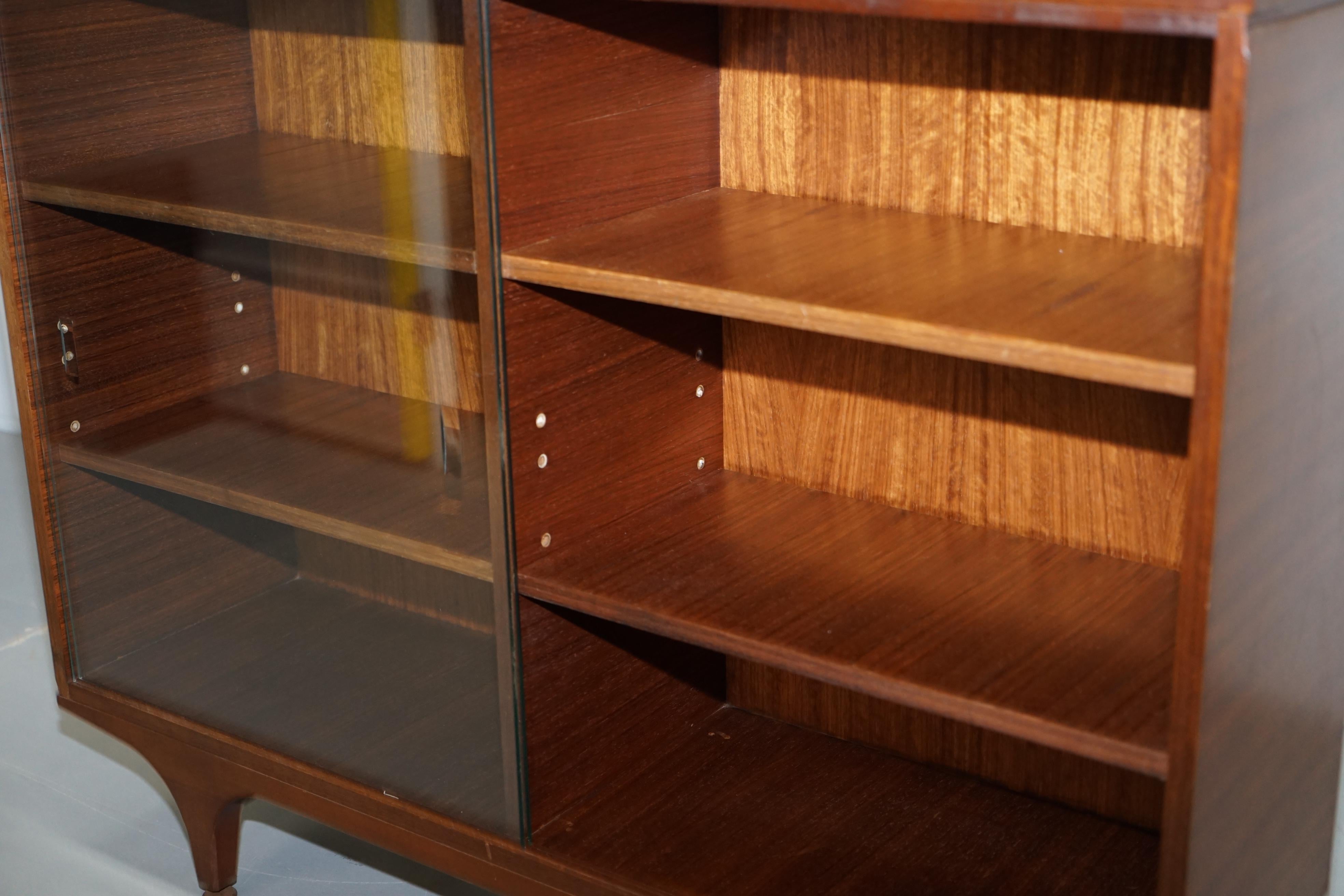 Pair of Sculpted Mid-Century Modern Teak Bookcases with Glass Sliding Doors 15