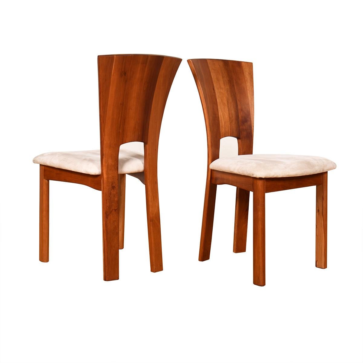 Pair of Sculpted Solid Wood Tallback Accent Chairs in Ultra-Suede

Additional information:
Material: Wood
Featured at DC:
Graciously tapered backrest with cutout in the middle bottom to lighten the appearance.
Back also forms the gently curved