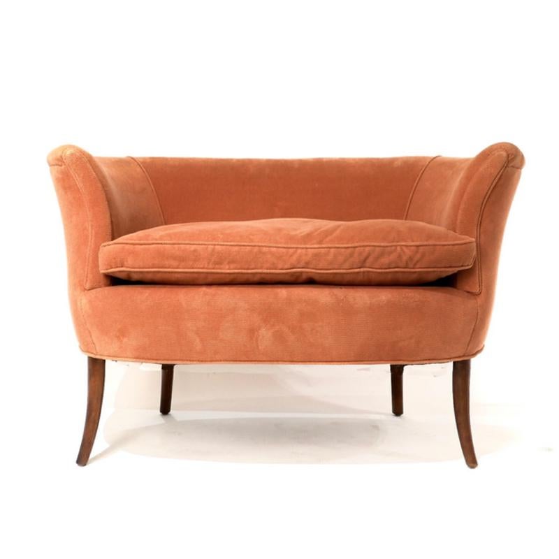 A glamorous pair of custom 1940s curvy French settees or loveseats with down filled seat cushions featuring a sculptural look that would elevate any interior.
   
