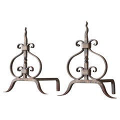 Pair of Sculptural Andirons or Fire Dogs in Wrought Iron Early 20th Century
