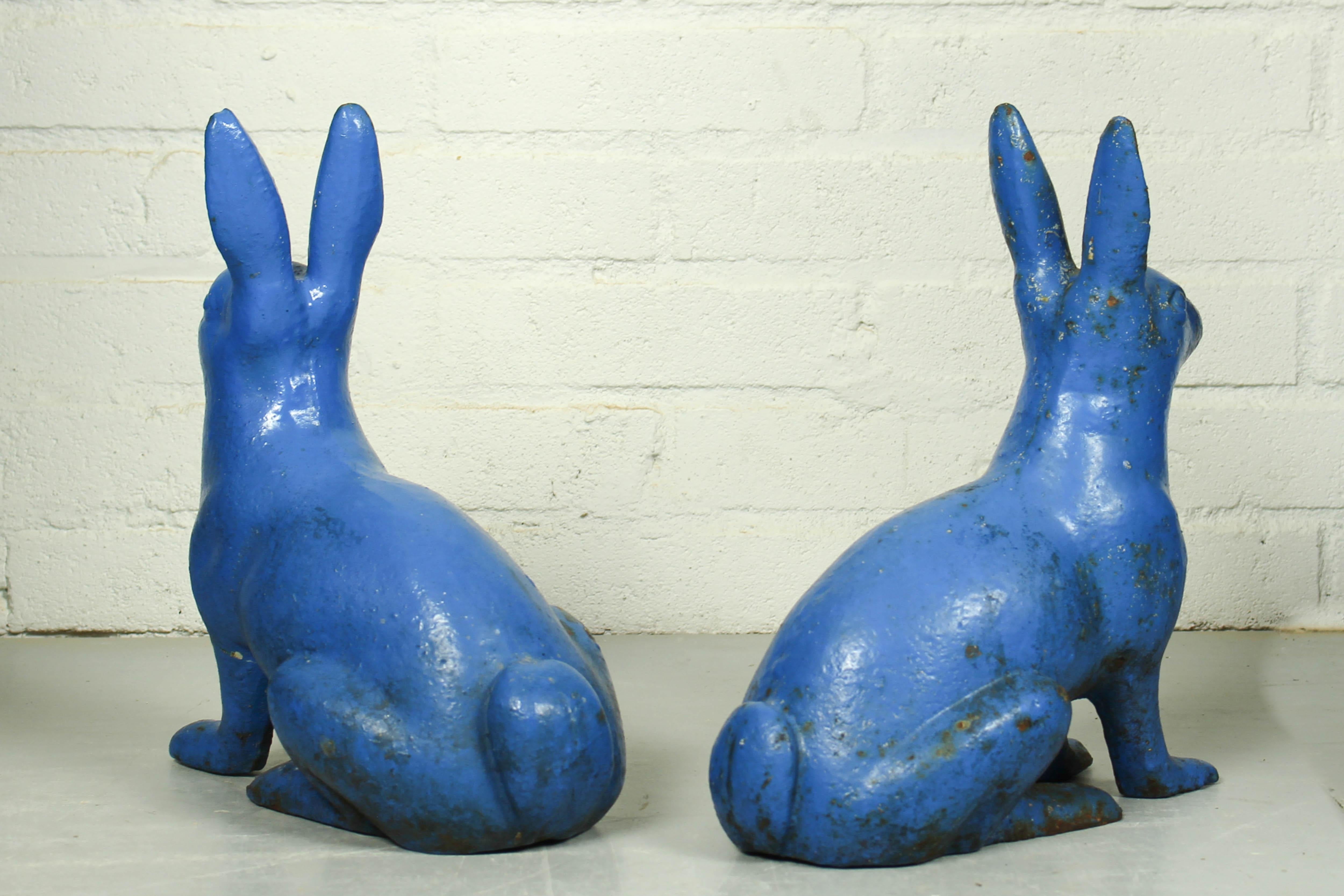 Romantic Pair of Sculptural Antique Figural Blue Painted Cast Iron Rabbit Doorstops For Sale