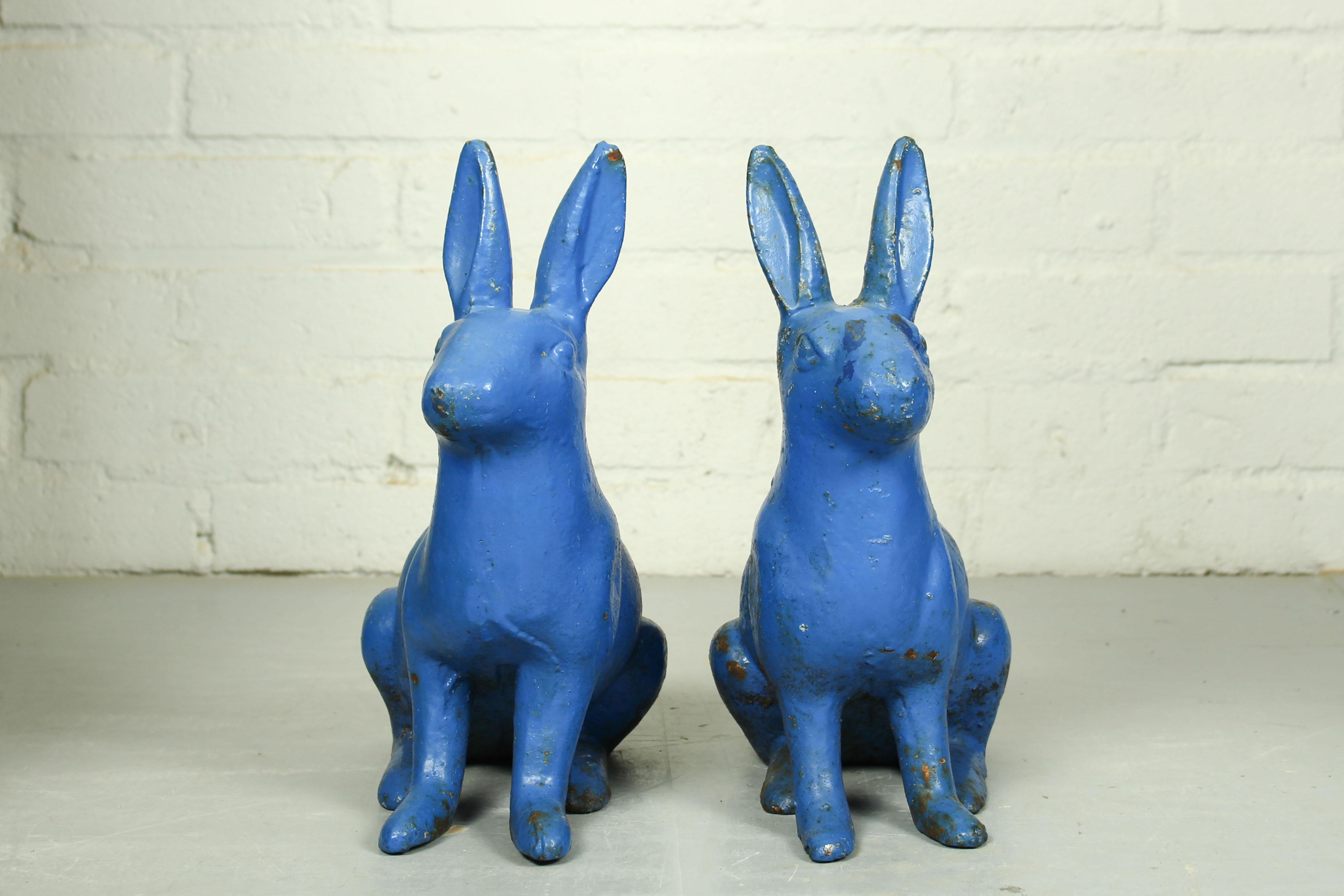 Late 19th Century Pair of Sculptural Antique Figural Blue Painted Cast Iron Rabbit Doorstops For Sale