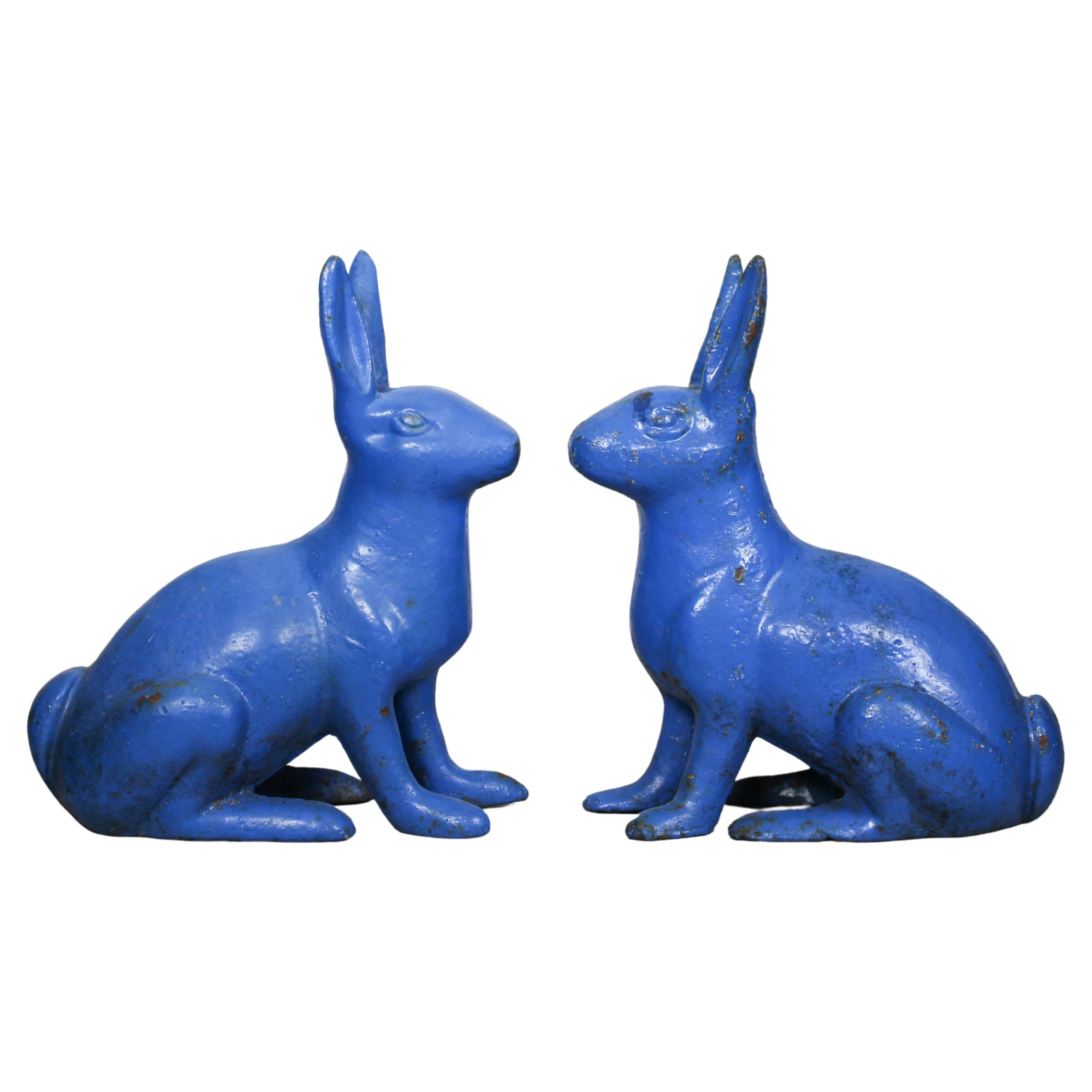Pair of Sculptural Antique Figural Blue Painted Cast Iron Rabbit Doorstops For Sale