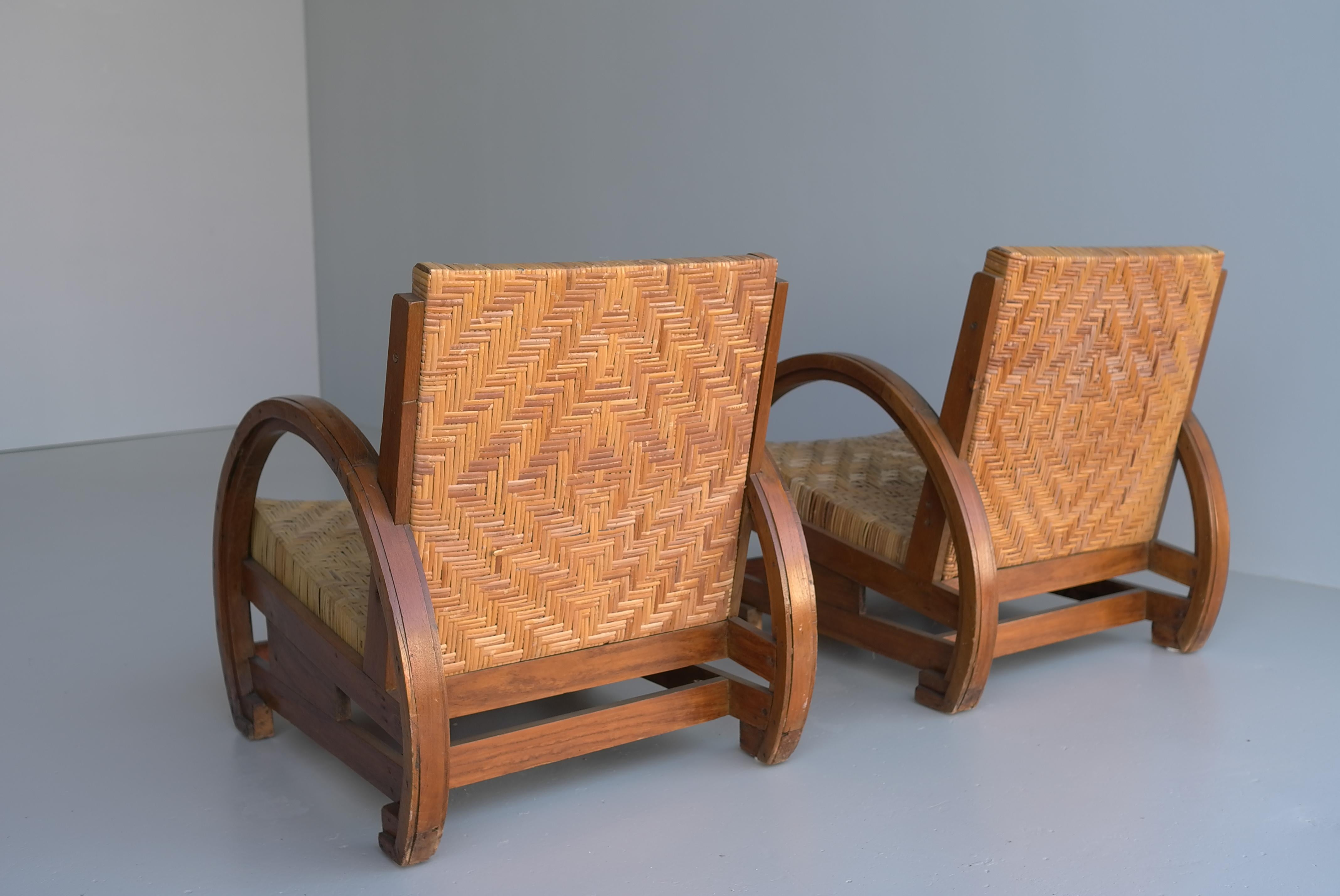 Unknown Pair Of Sculptural Art Deco Armchairs in Wood with Rush seats 1930's For Sale