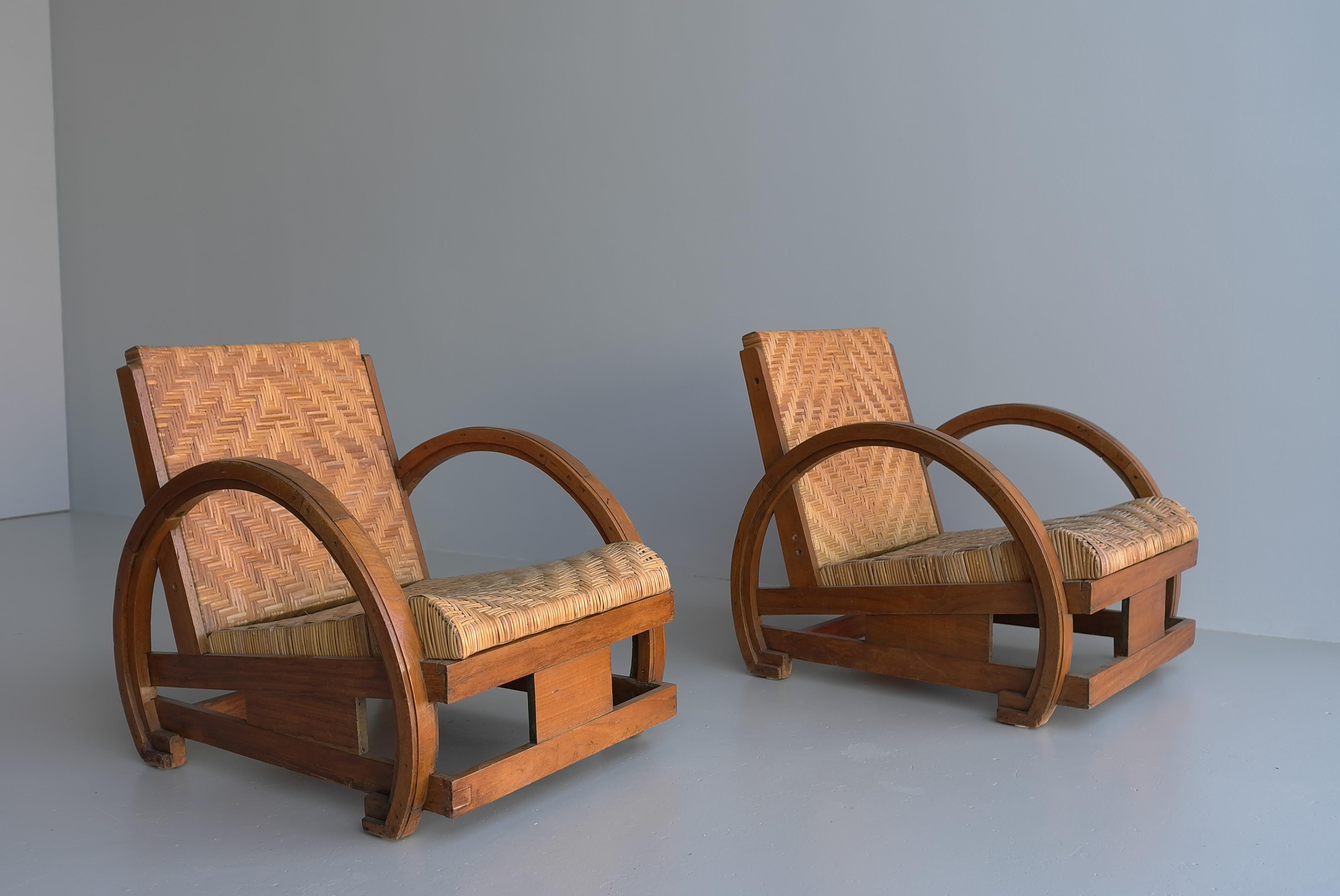 Mid-20th Century Pair Of Sculptural Art Deco Armchairs in Wood with Rush seats 1930's For Sale