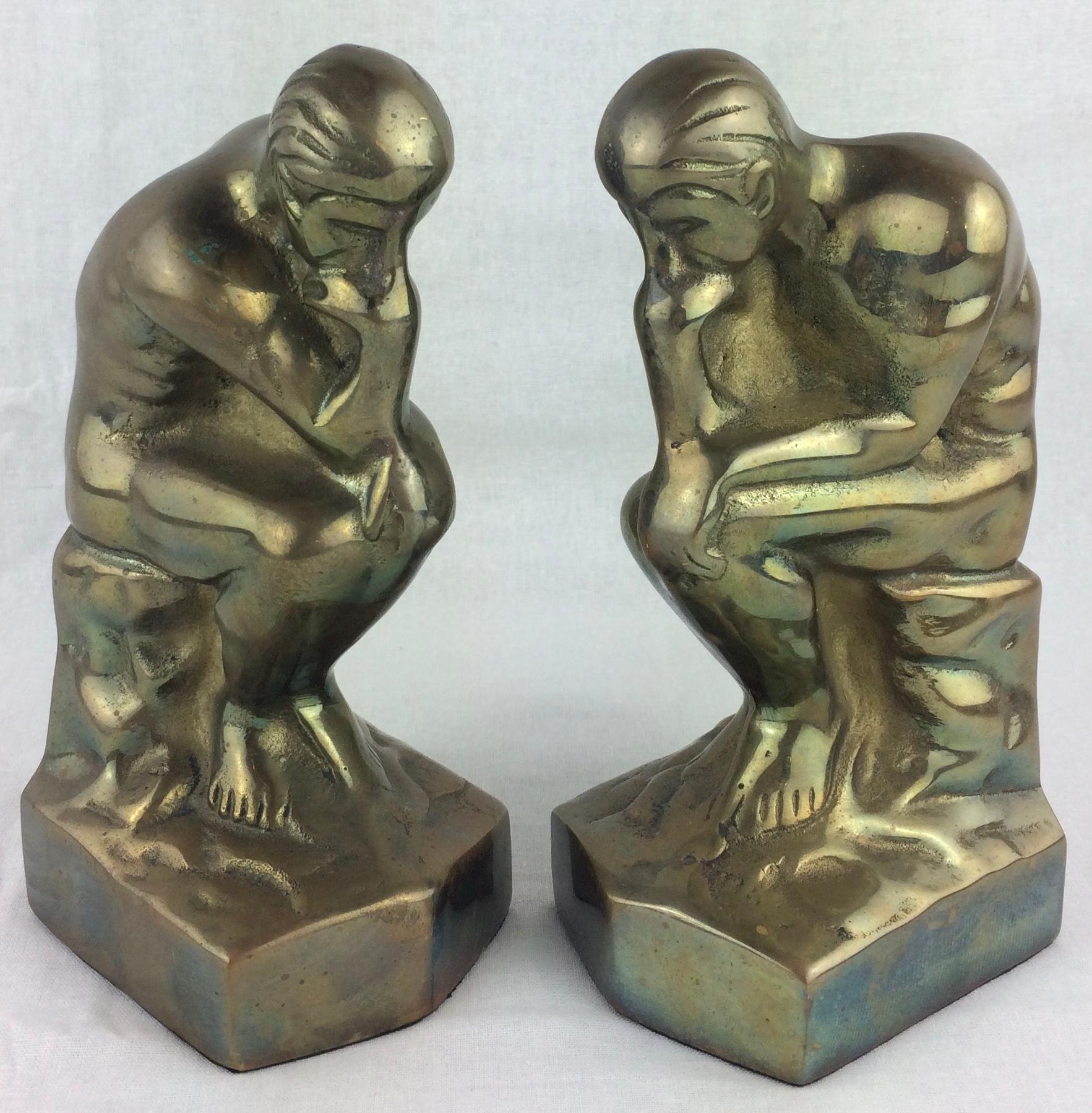 A fine quality pair of French sculptural bookends of muscular male nudes.  
Additional photos provided upon request.

These handcrafted bookends are particularly interesting, sculpted after a magnificent statue titled 