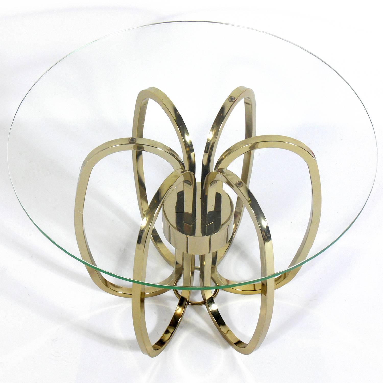 Pair of sculptural brass plated metal side tables, American, circa 1960s. They are a versatile size and can be used as end or side tables, or as nightstands.