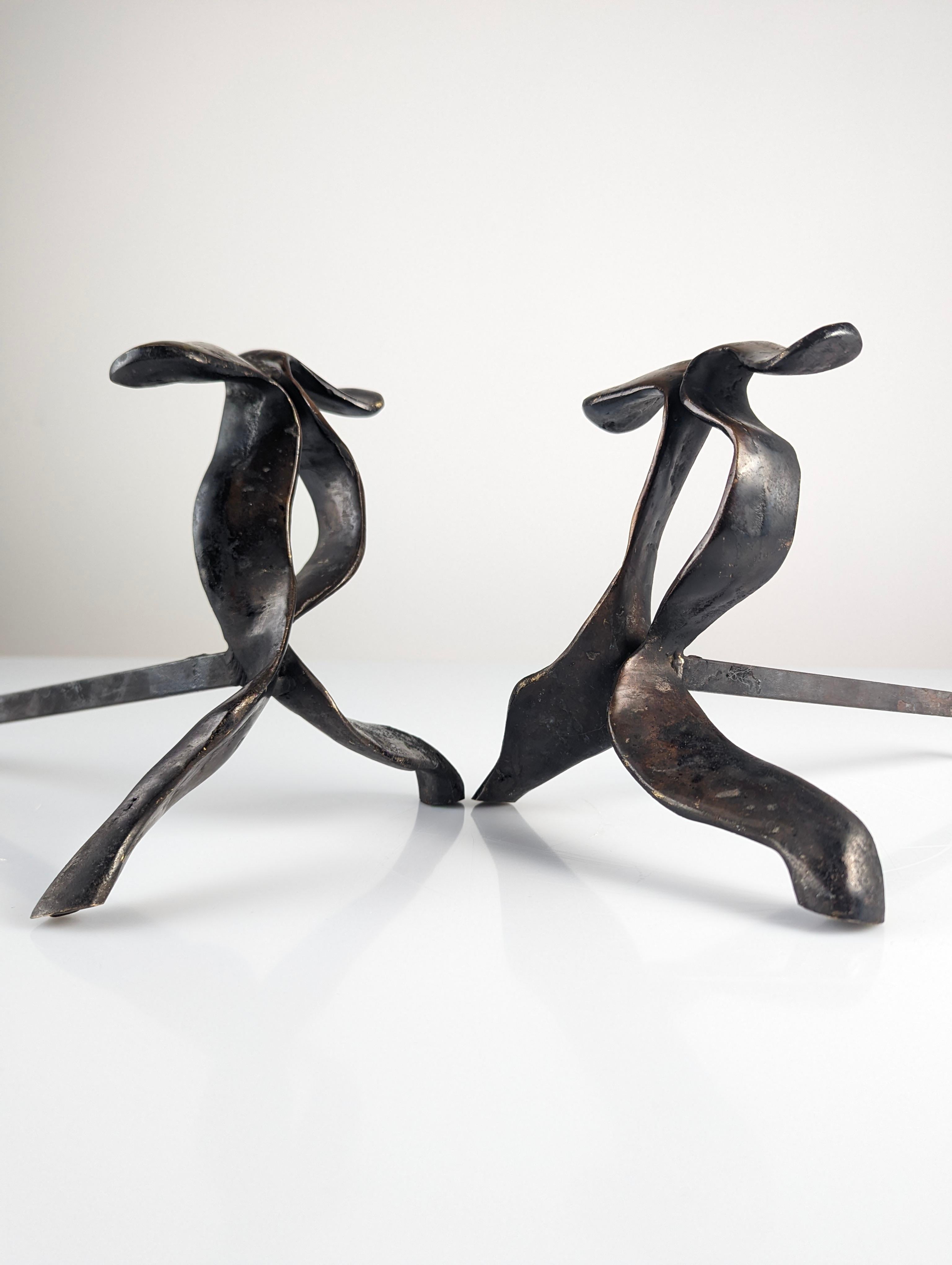 Pair of sculptural andirons for fireplace made of bronze from the 70s.

