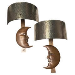 Pair of sculptural bronze sconces by Sergio Bustamente