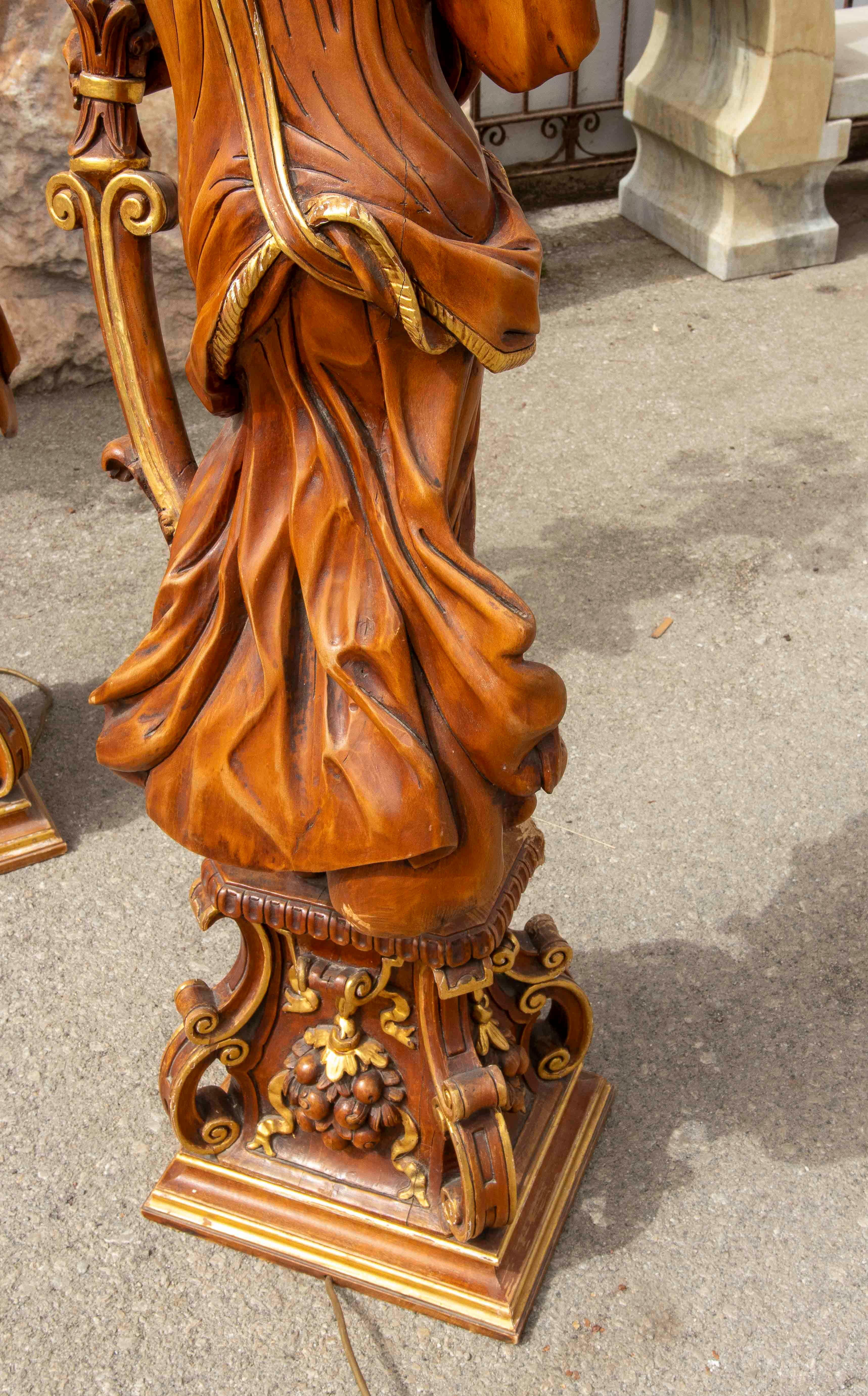 European Pair of Sculptural Candlesticks in Carved Wood, Electrified in the Baroque Style For Sale