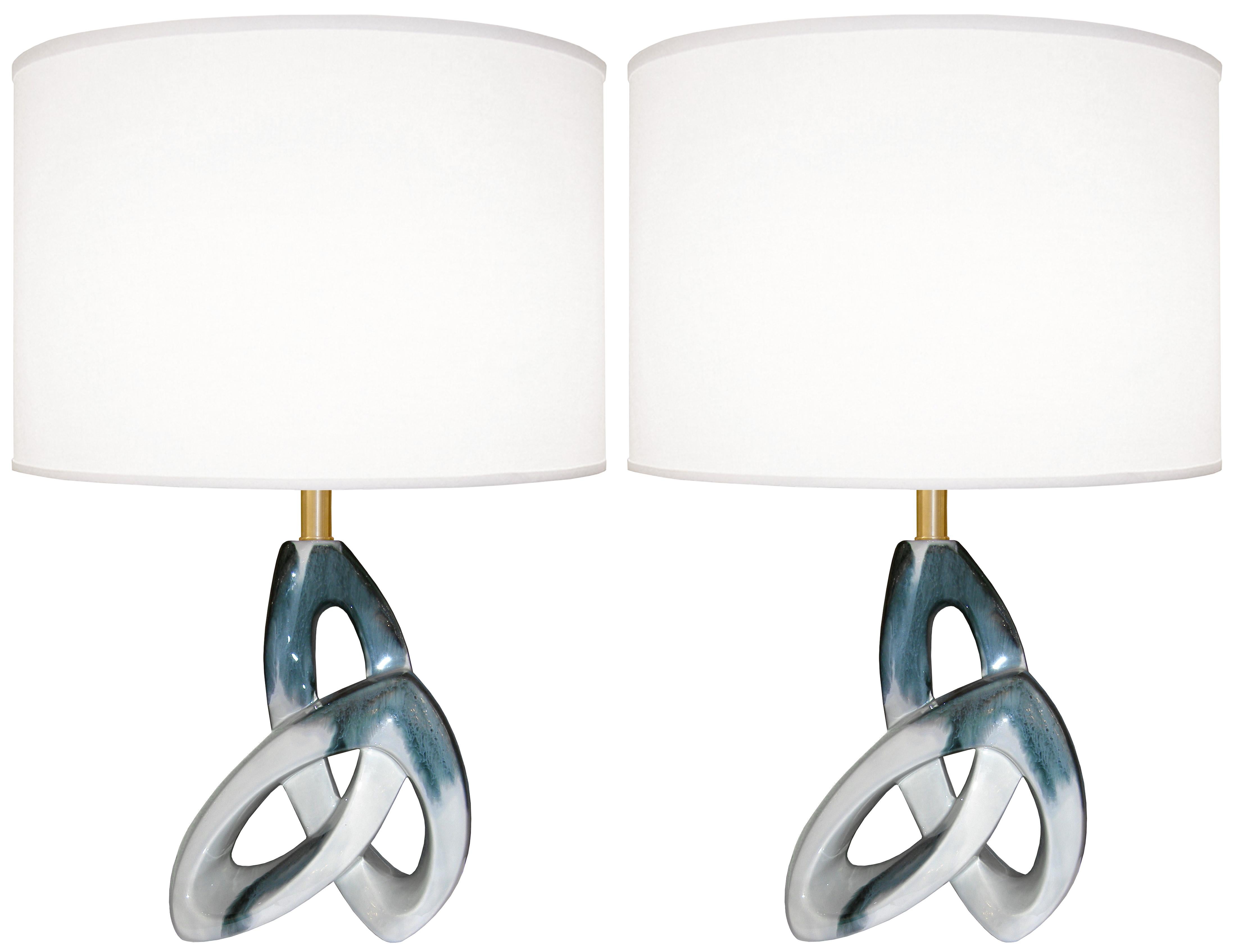 A pair of sculptural ceramic lamps with brass hardware.

Circa 1960's

Lamp Shades Are Not Included.

If you are interested in Lamp Shades, please email The Craig Van Den Brulle Design Team Via Message Center, and we will provide you with a