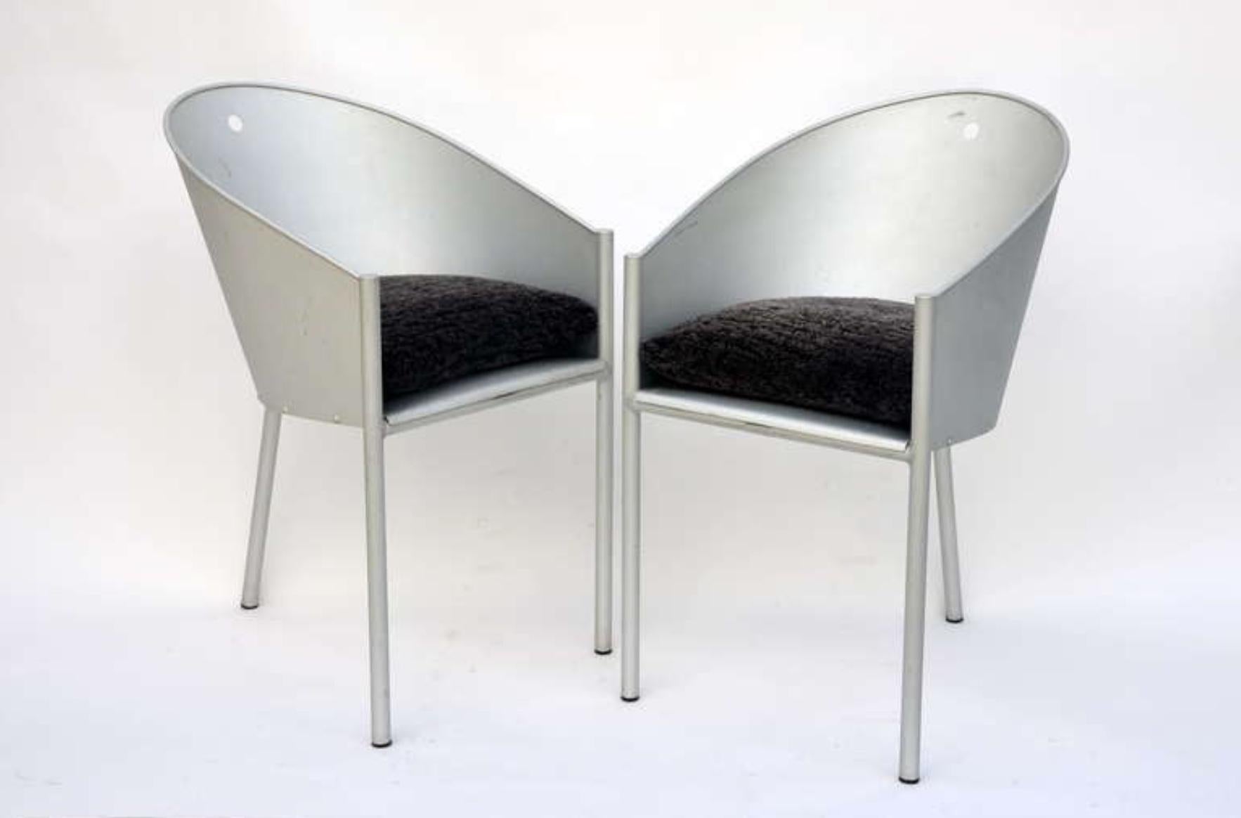 Pair of sculptural chairs by Philippe Starck. New wool-upholstered seat cushions.