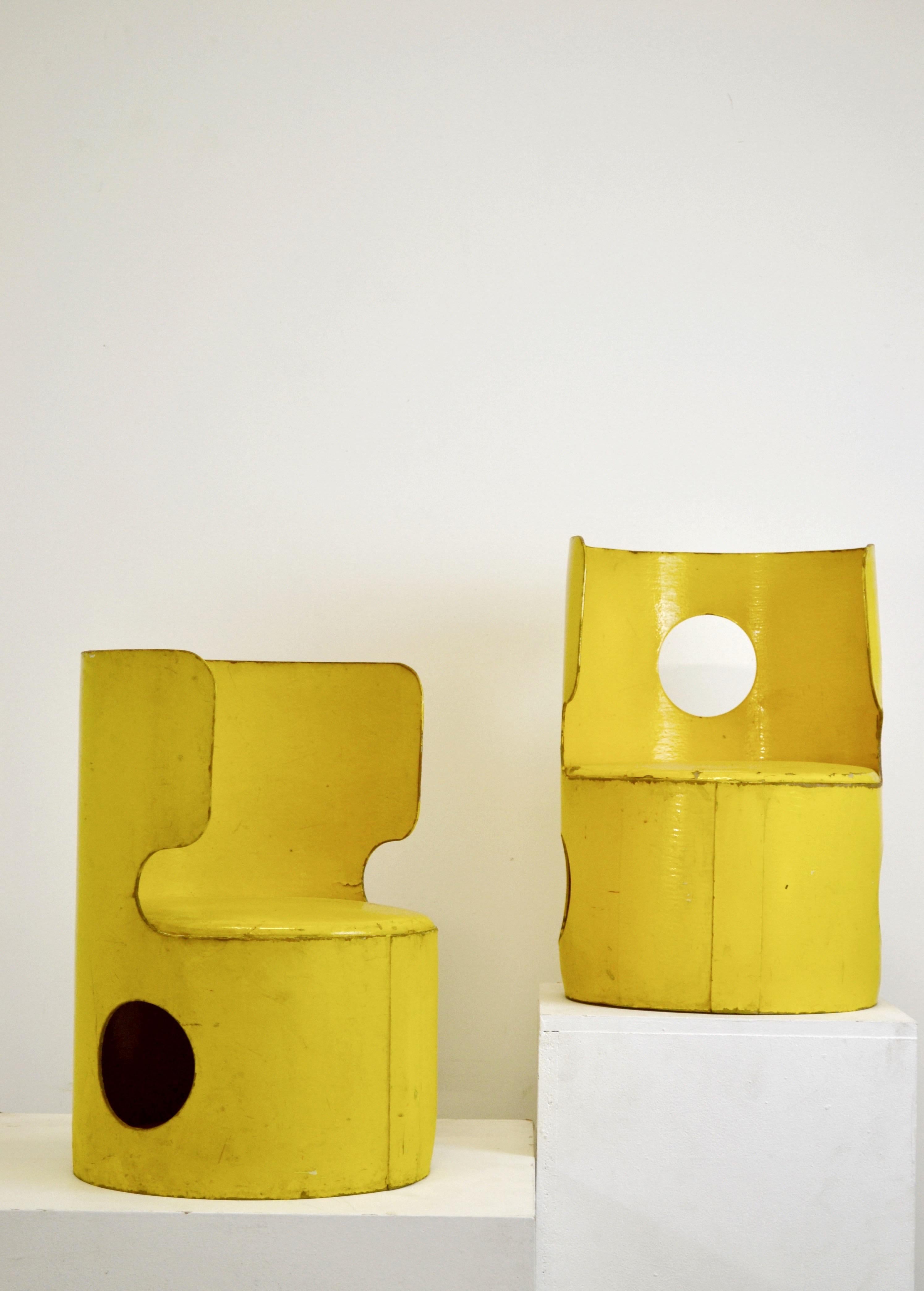 Extremely rare pair of children’s chairs designed by Jean‑Louis Avril in the 1970s, part of his iconic and avant‑garde series of cardboard furniture.

Made of laminated and lacquered cardboard, these playful cylindrical forms feature organic curves