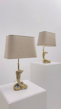 Pair of Sculptural cobra Table lamps in Brass
