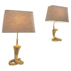 Pair of Sculptural cobra Table lamps in Brass