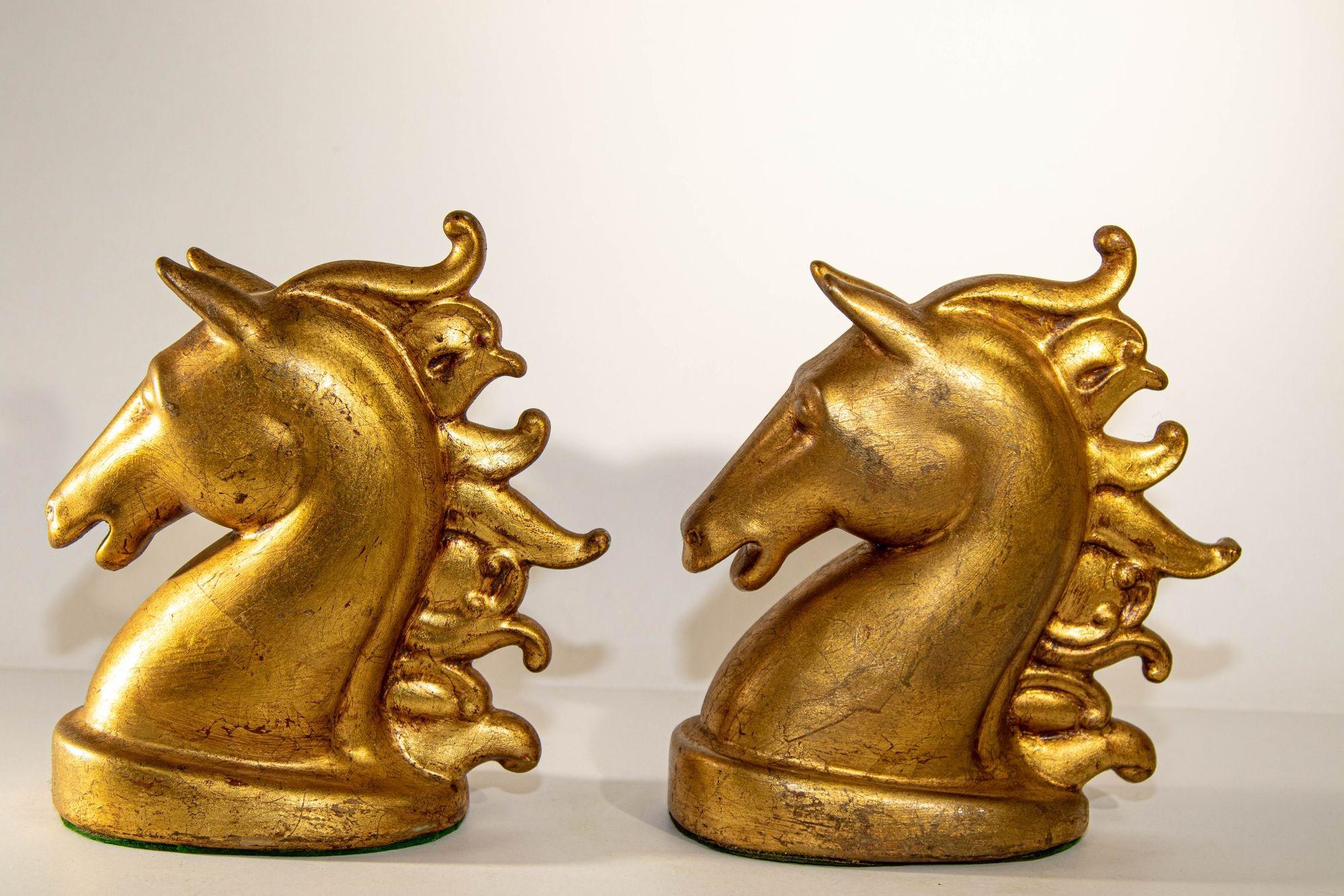 Striking pair of vintage gilt ceramic horse head bookends, circa 1950s, Equestrian Decor.
Pair of 24 K gilt leaf brass antique look midcentury bookends sculpted in the form of Majestic horse heads.
Art Deco style bookends ceramic well modeled