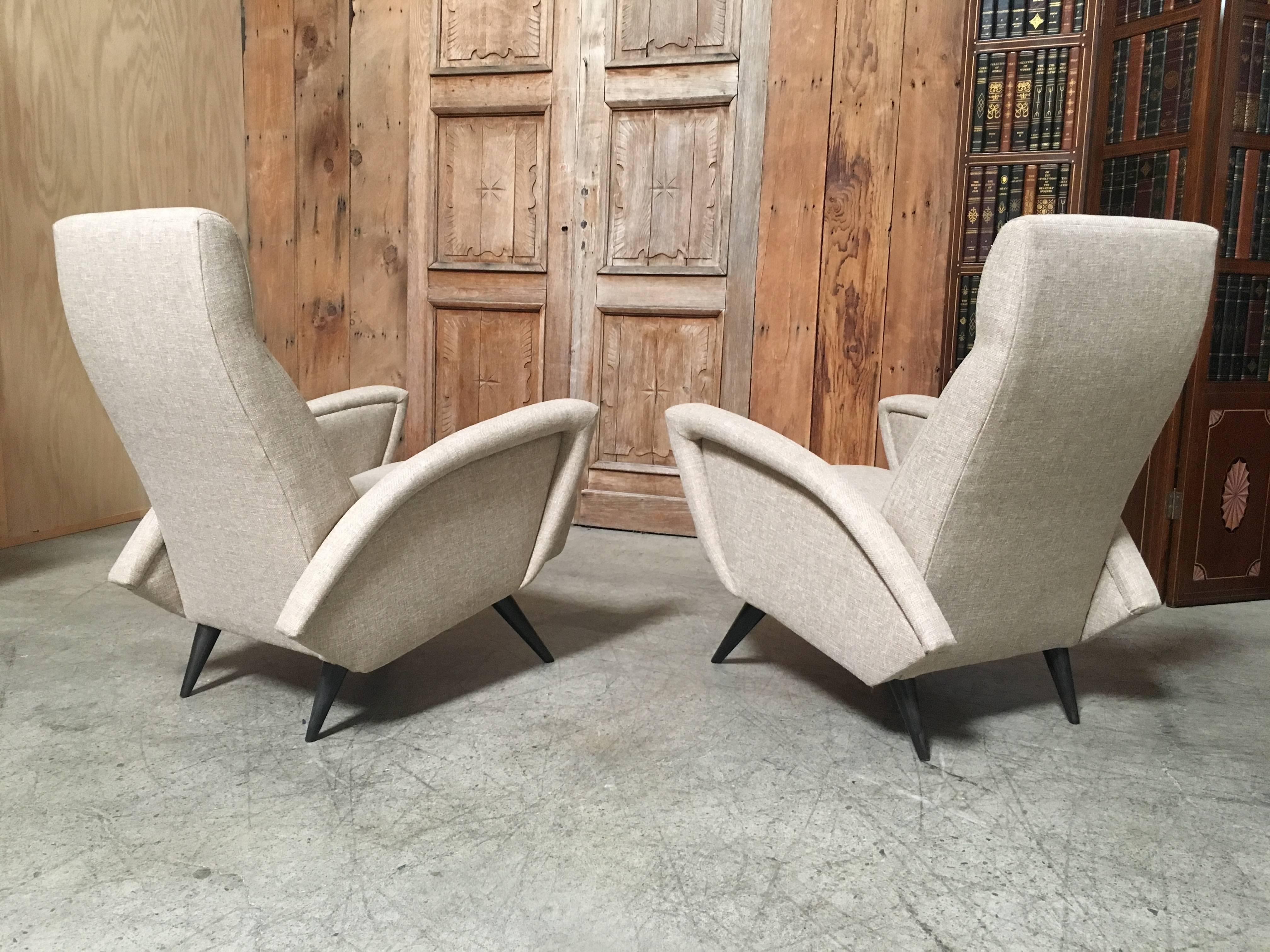 Pair of sculptural Italian lounge chairs.
