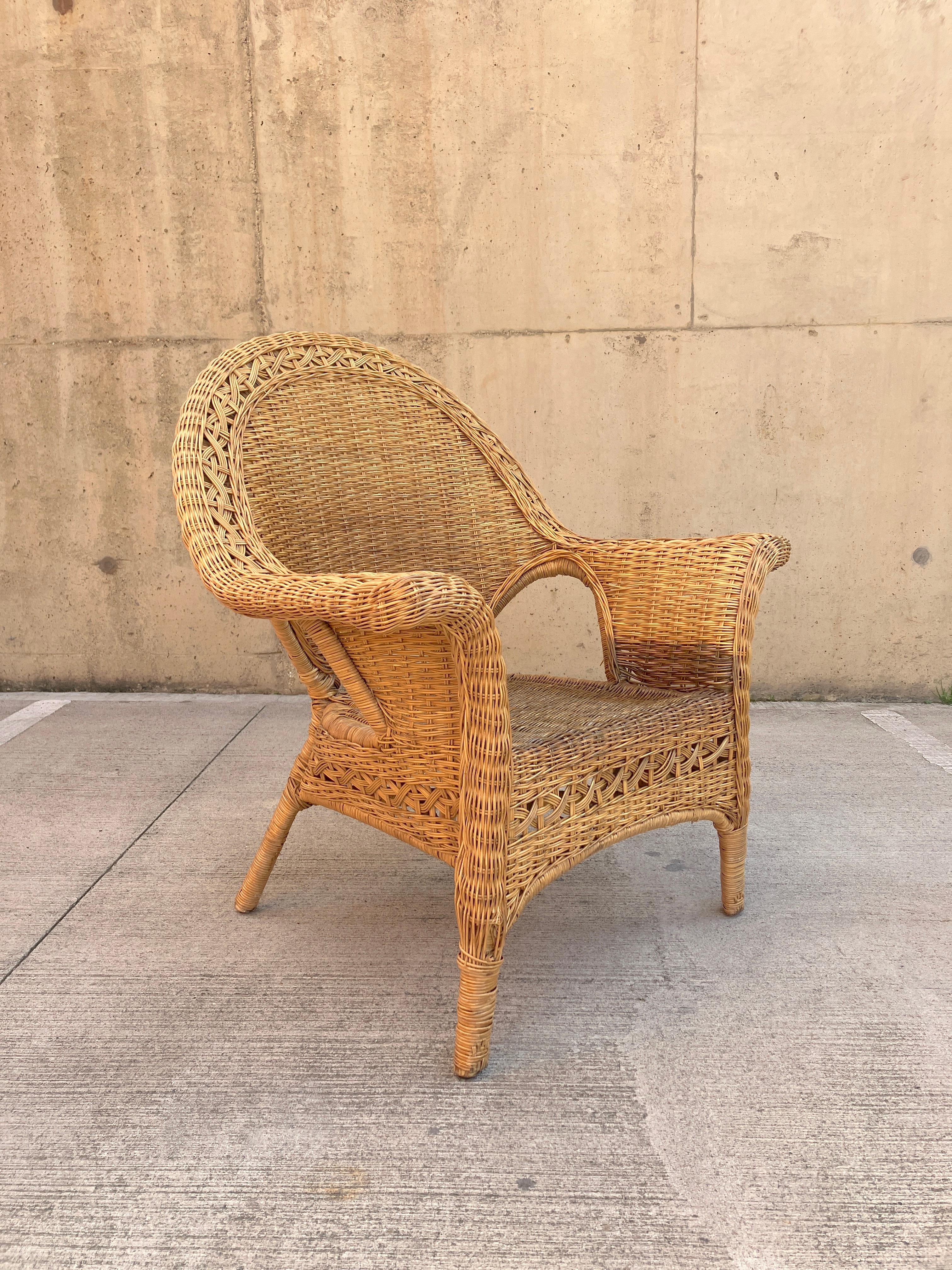 Bohemian Pair of sculptural large wicker armchairs in rattan 20th century For Sale