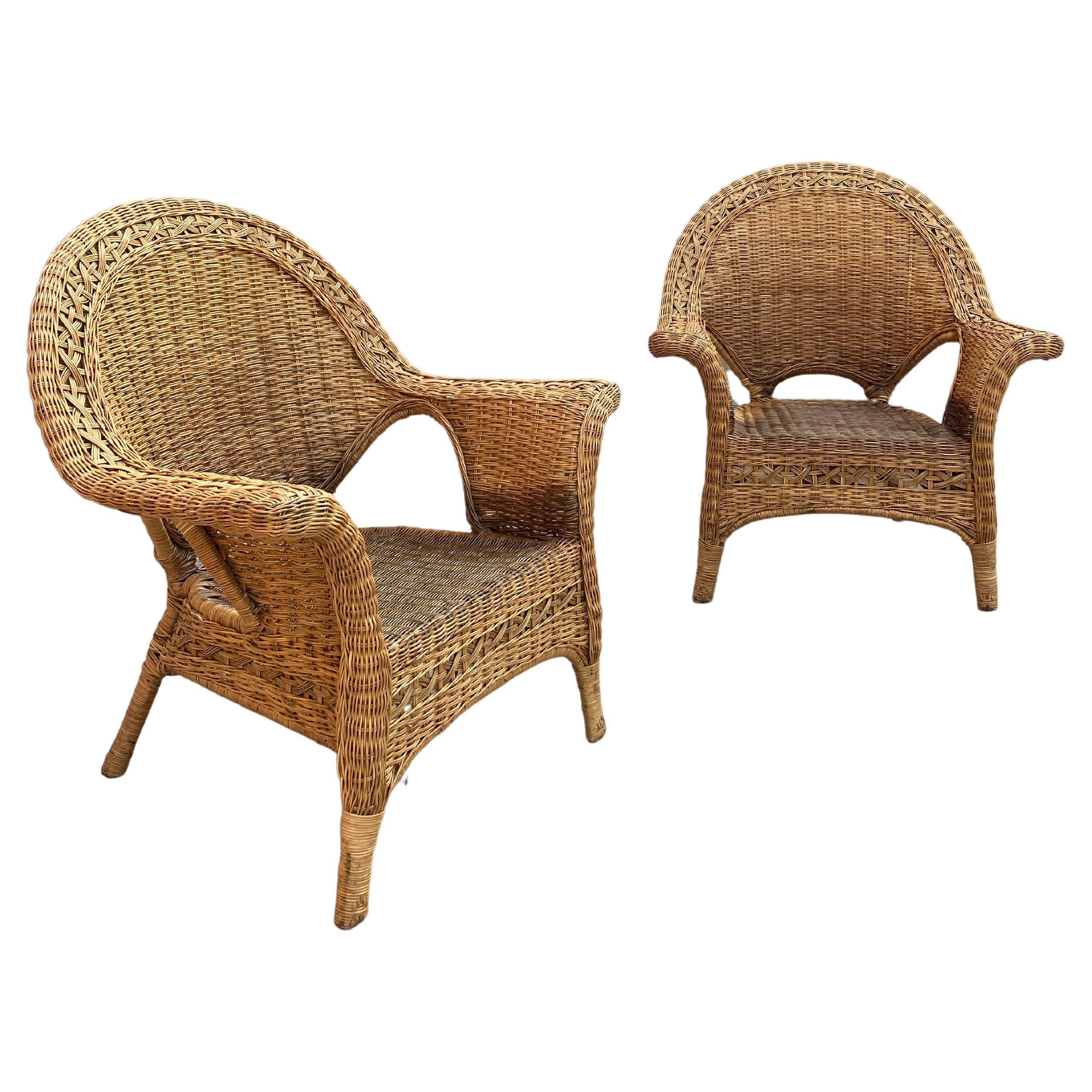 Pair of sculptural large wicker armchairs in rattan 20th century For Sale
