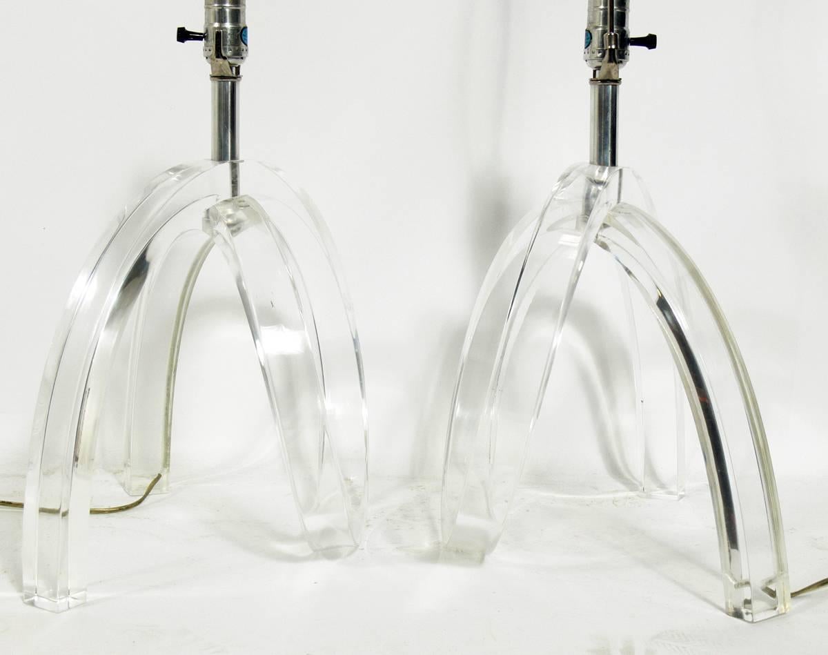 Pair of sculptural Lucite lamps, American, circa 1960s. The price noted below includes the shades.