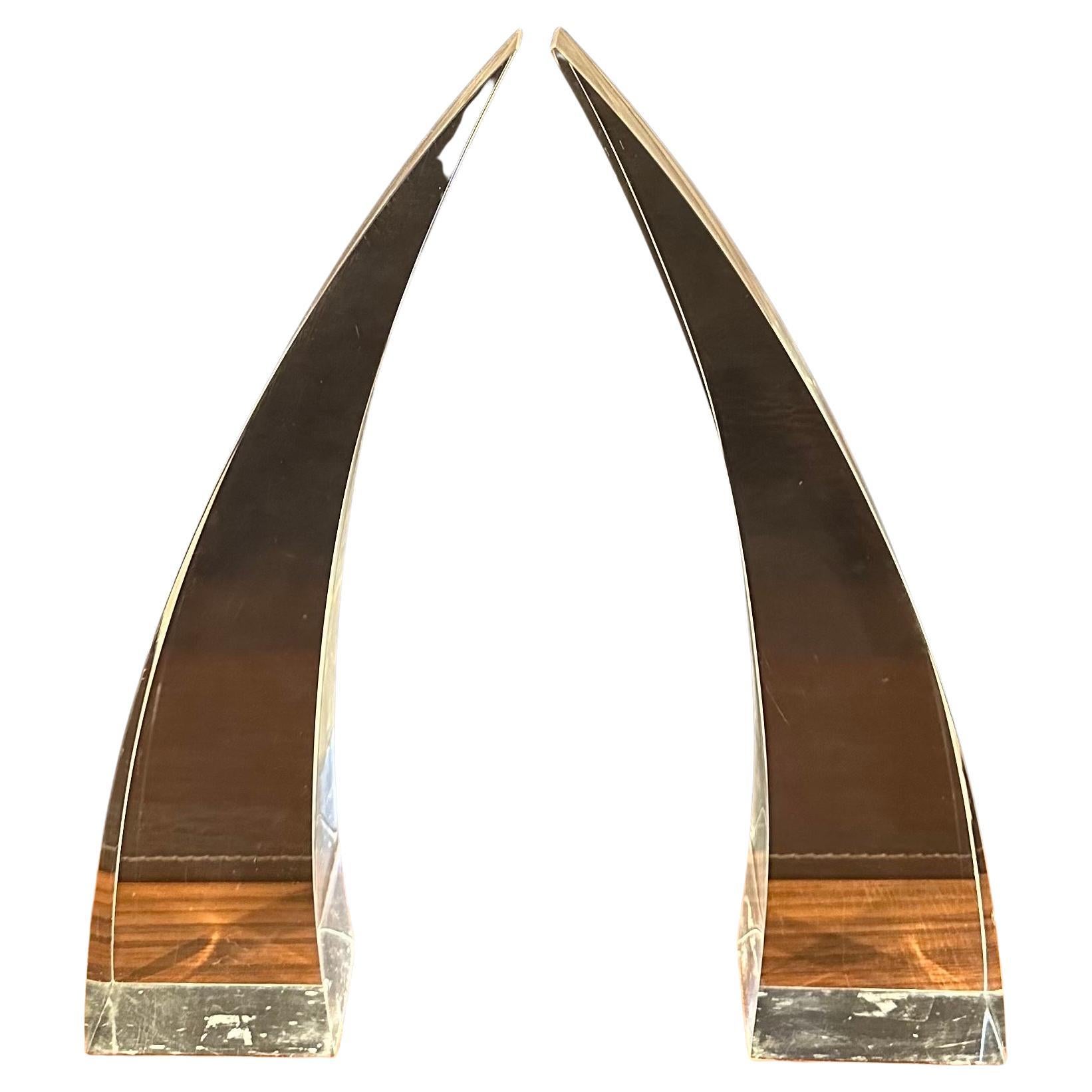 A pair of sculptural modern lucite horns, circa 1970s.  The set is in good vintage condition and measures 11.5