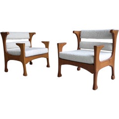 Pair of Sculptural Oak Lounge Chairs, in White Bouclé Upholstery, France, 1960
s Pair of Sculptural Oak Lounge Chairs, in White Bouclé Upholstery, France, 1960
s