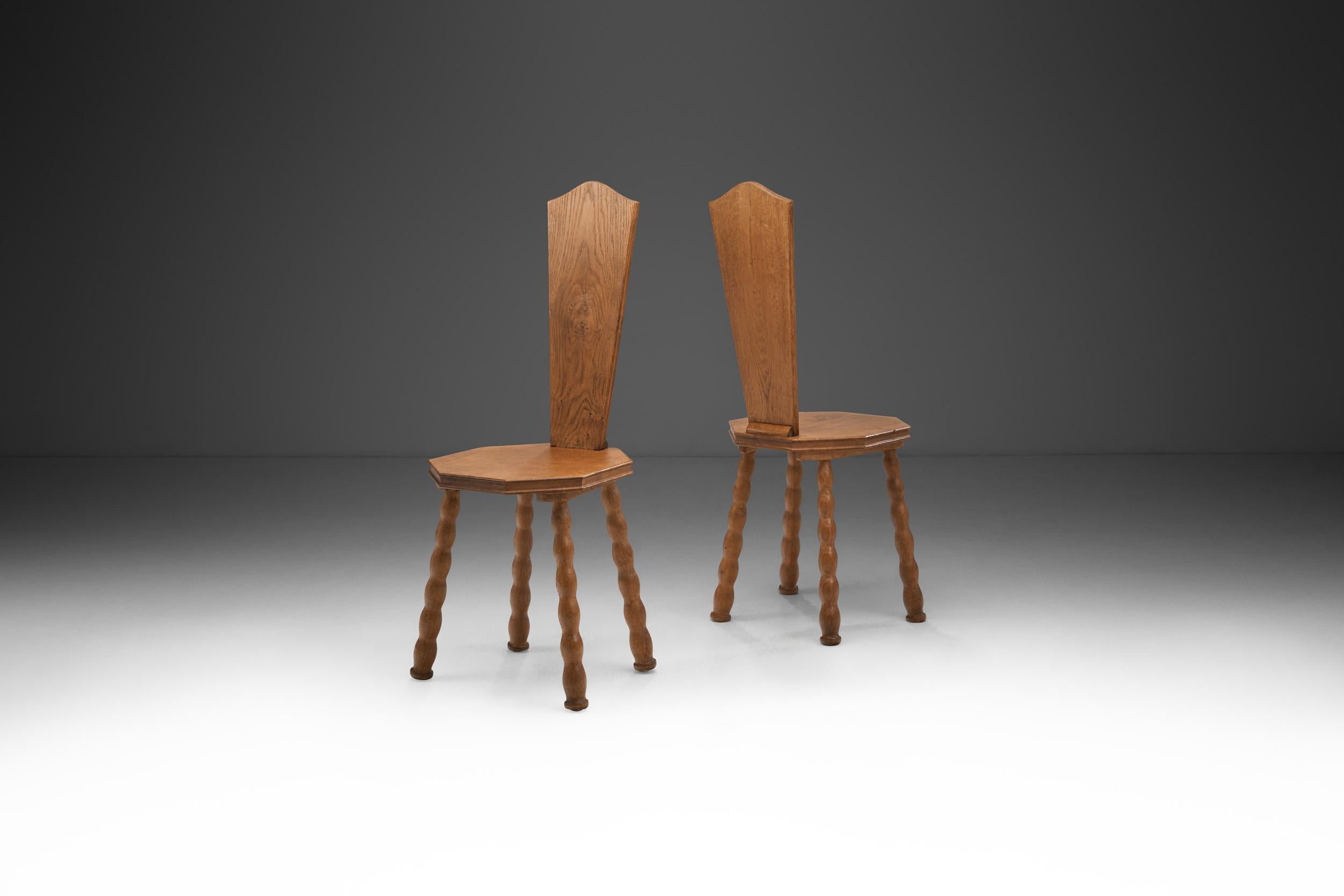 Mid-Century Modern Pair of Sculptural Patinated Oak Spinning Chairs, Europe Ca Early 20th Century For Sale