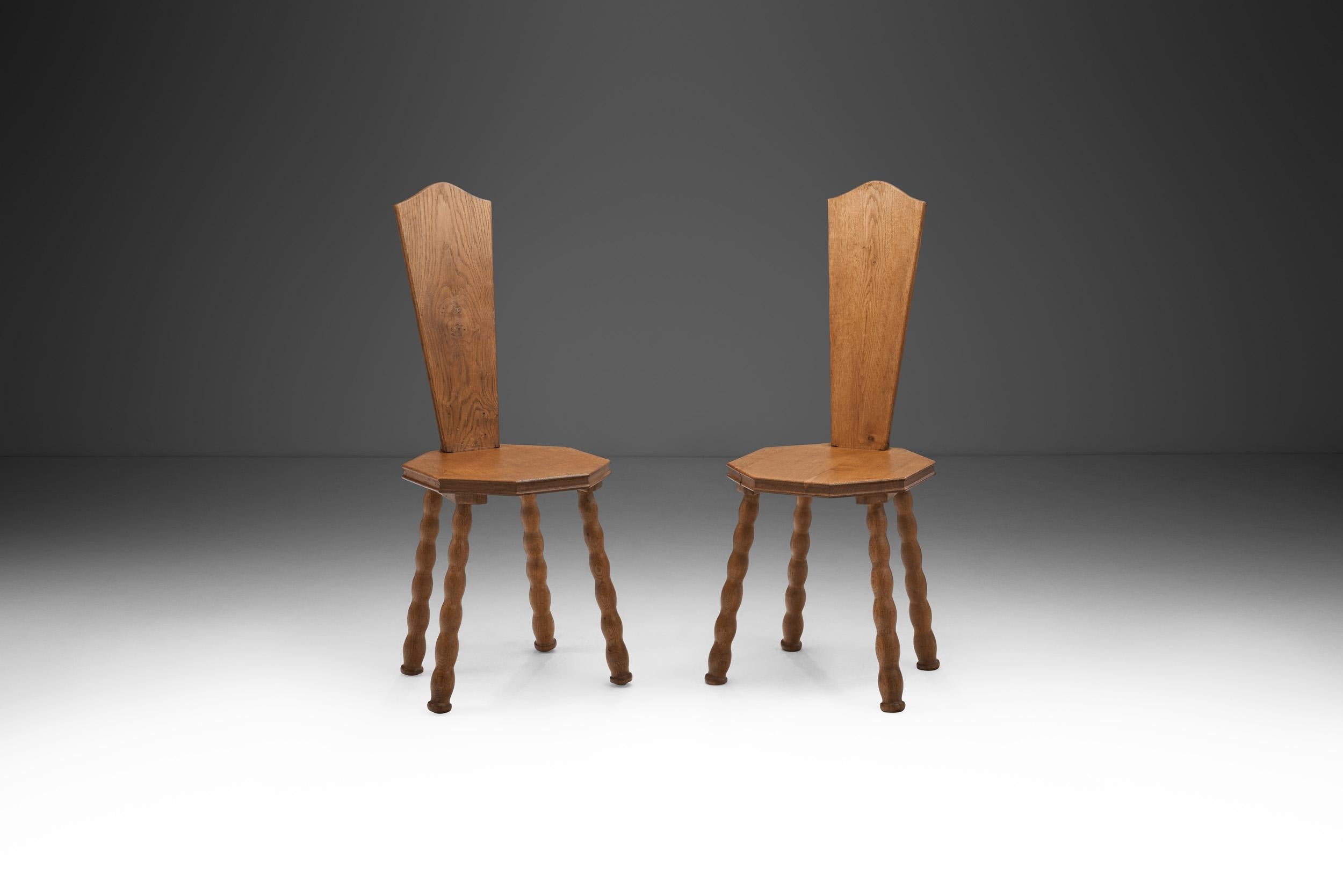 European Pair of Sculptural Patinated Oak Spinning Chairs, Europe Ca Early 20th Century For Sale