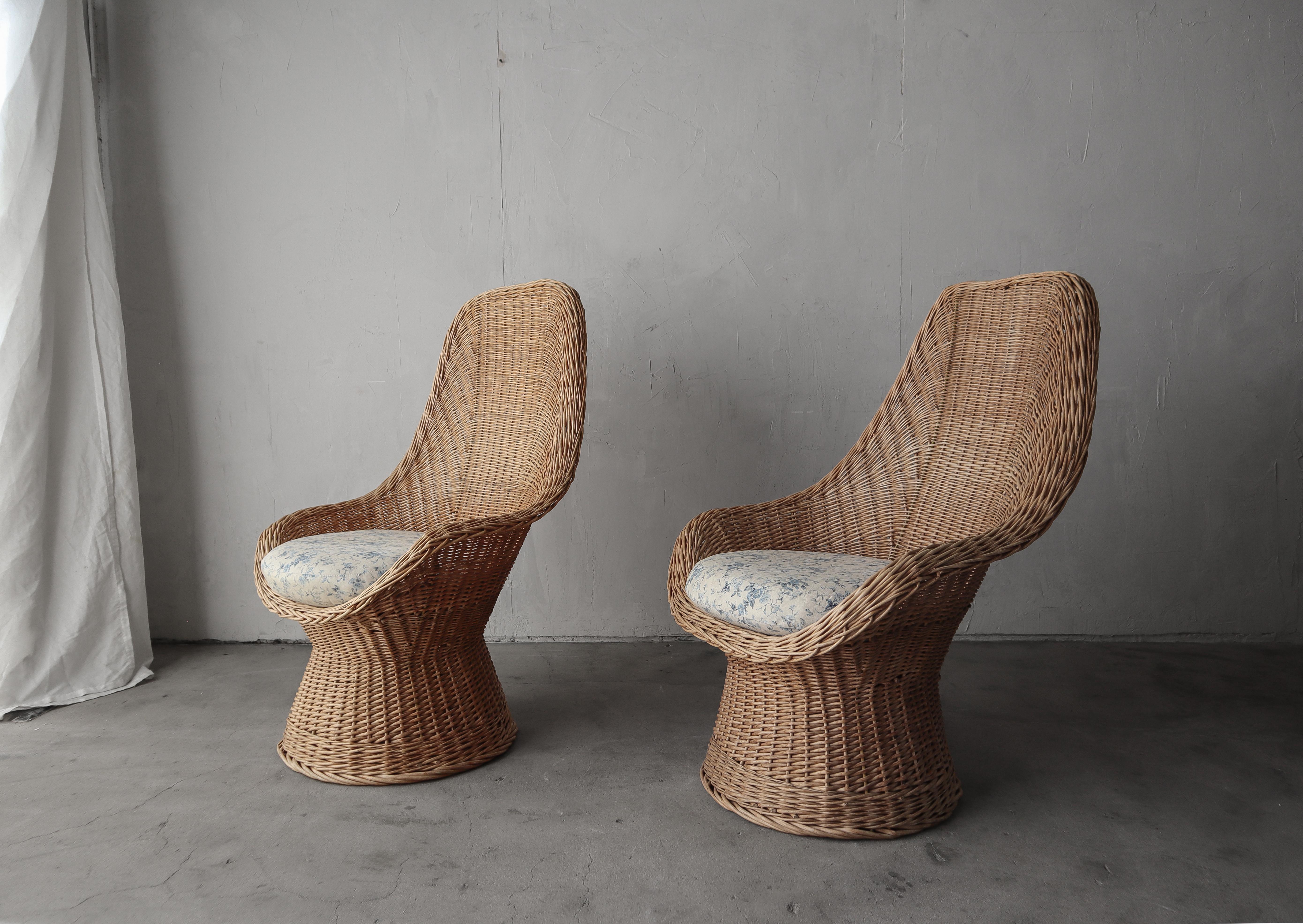Excellent pair of 1970s, Polish wicker scoop lounge chairs.

Chairs are in excellent vintage condition with no actual damage.  The fabric on the seat cushions is useable but these would be lovely redone.




