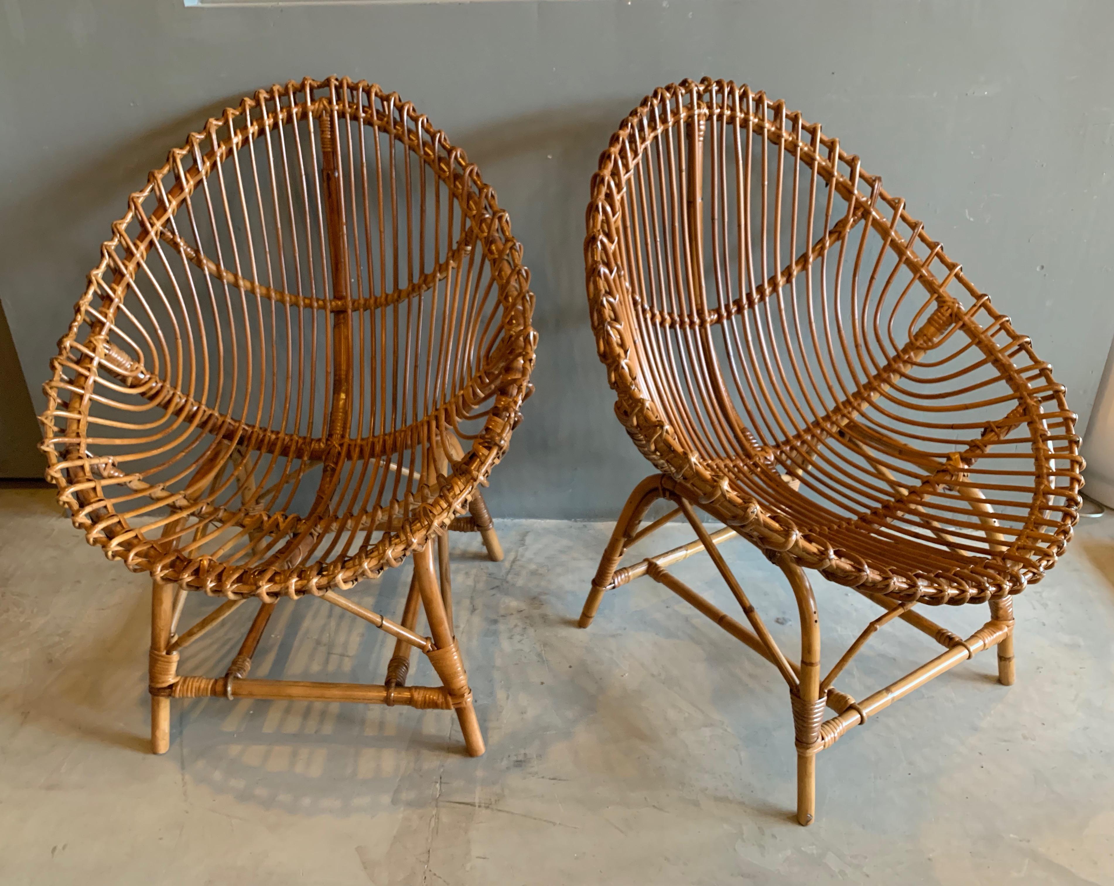 Elegant pair of rattan and bamboo chairs. Made in Italy. Very good vintage condition. Great scale.