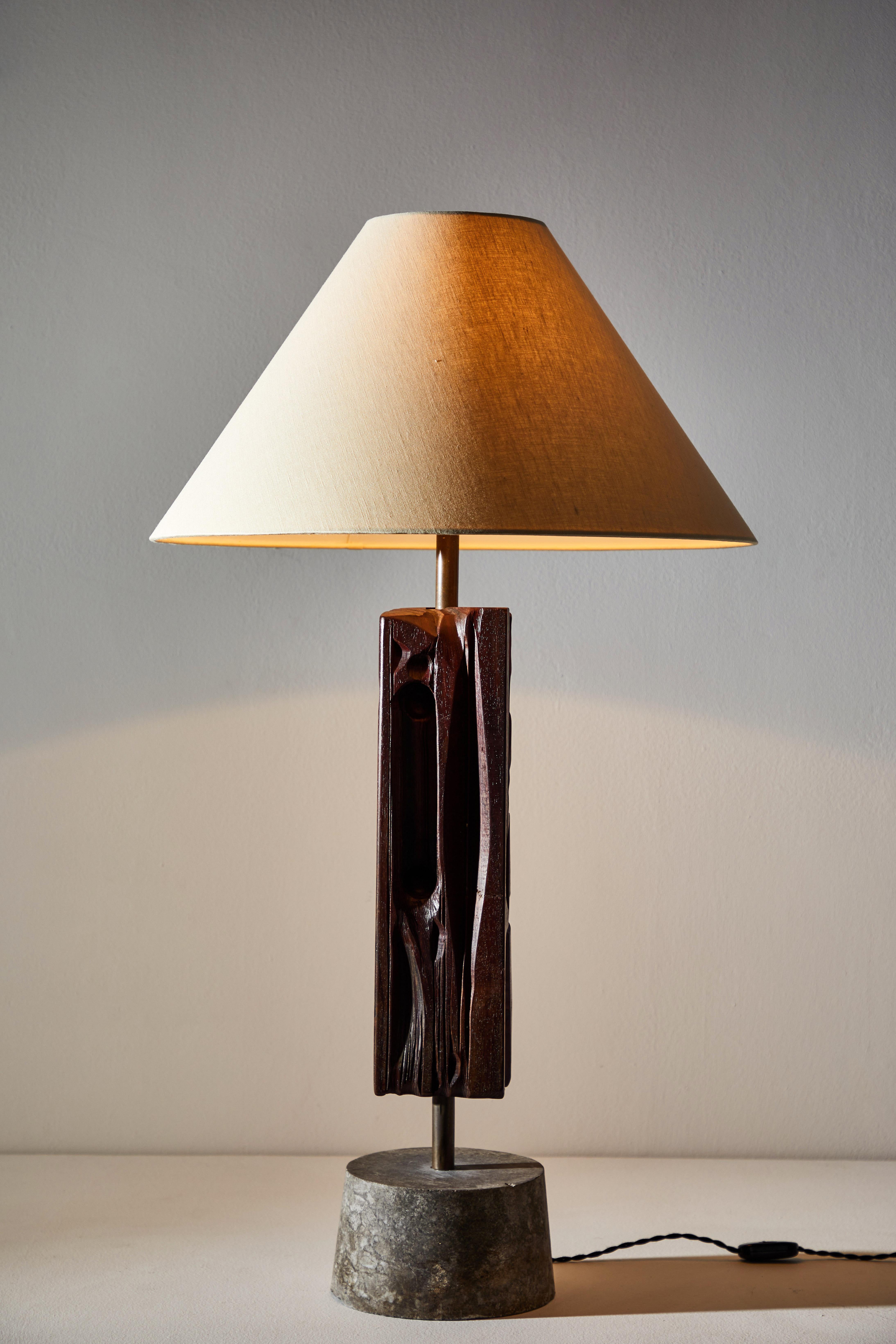 Unique pair of rare sculptures mounted as table Lamps by Yasuo Fuke in Italy, circa 1970s. Hand carved wood, brass, marble. Rewired for US standards with black french twist cord. Custom linens shades. Signed and numbered by the artist. We recommend