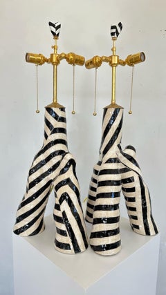 Pair of sculptural table lamps in black and white geometric stripe