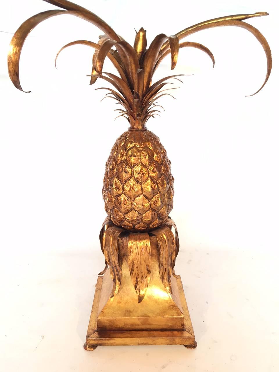 Fabulous pair of sculptural pineapple side tables perfect for your Hollywood Regency decor. Glass tops are 3/4