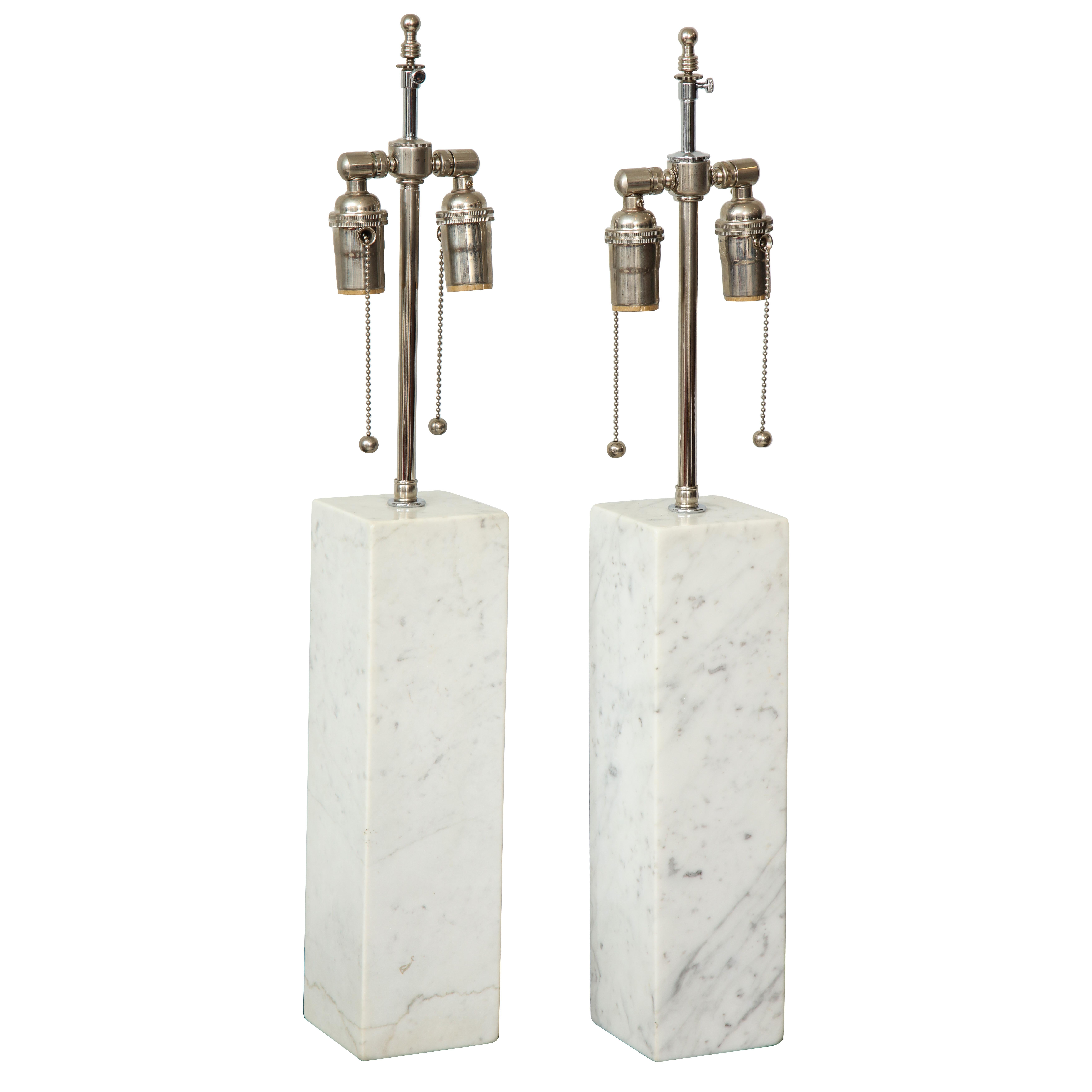 Pair of sculptural vintage Calacatta marble lamps.
Measures: Height to clusters 26 3/4, height to base of lamps 14.