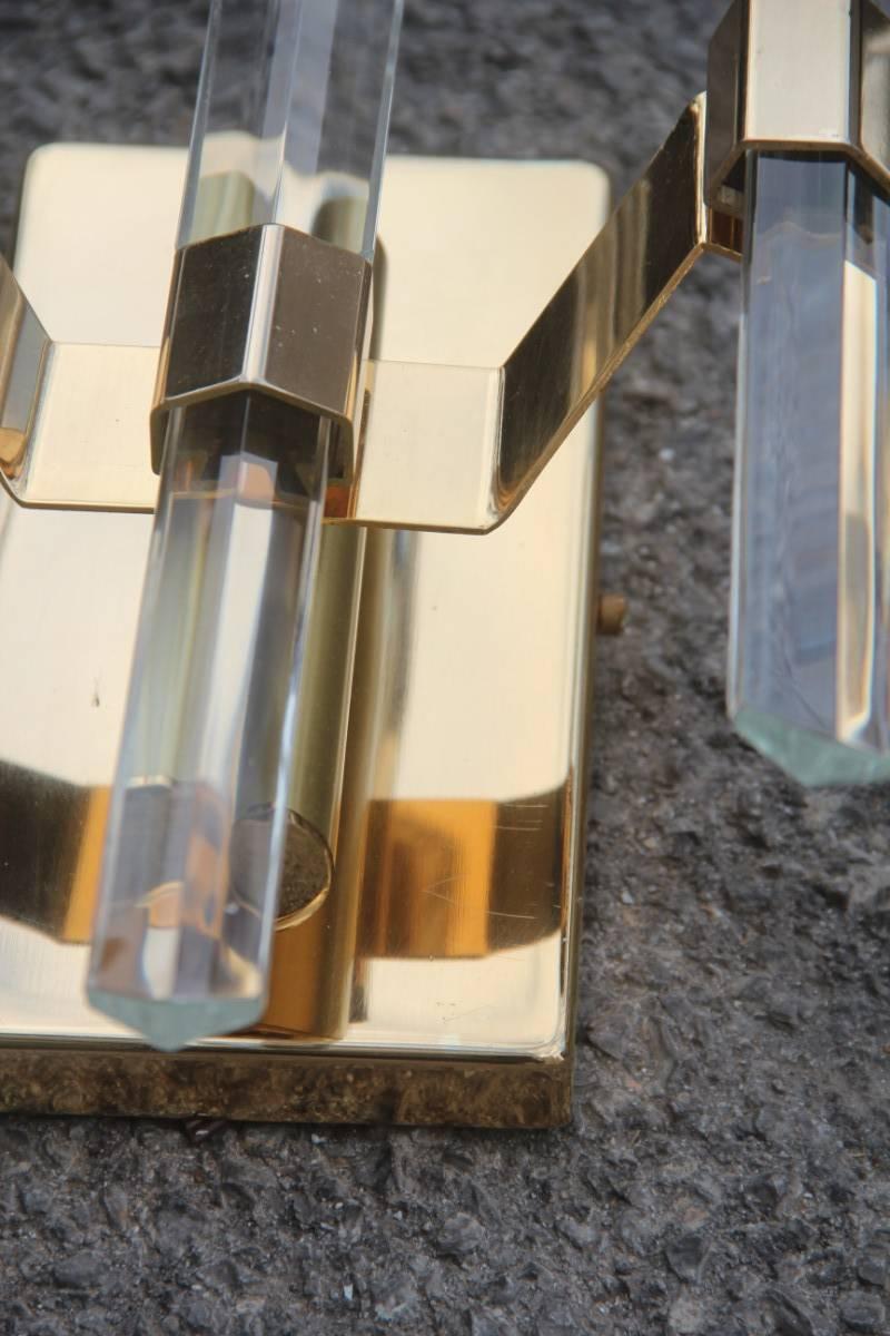 Italiano Coppia di sculture da parete 1970 in metallo dorato Sciolari in vendita