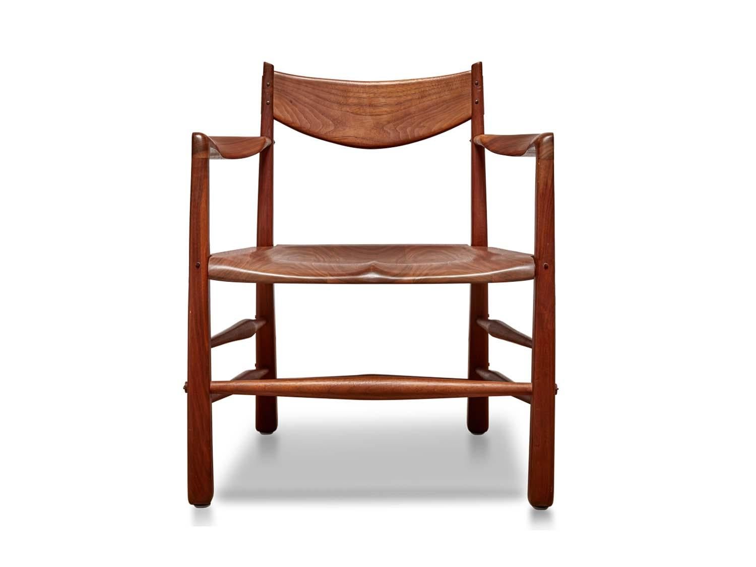 Pair of sculptural walnut chairs by Richard Patterson.