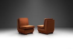 Pair of Sculptural Wooden Lounge Chairs with Cognac Upholstery, Europe 1970s