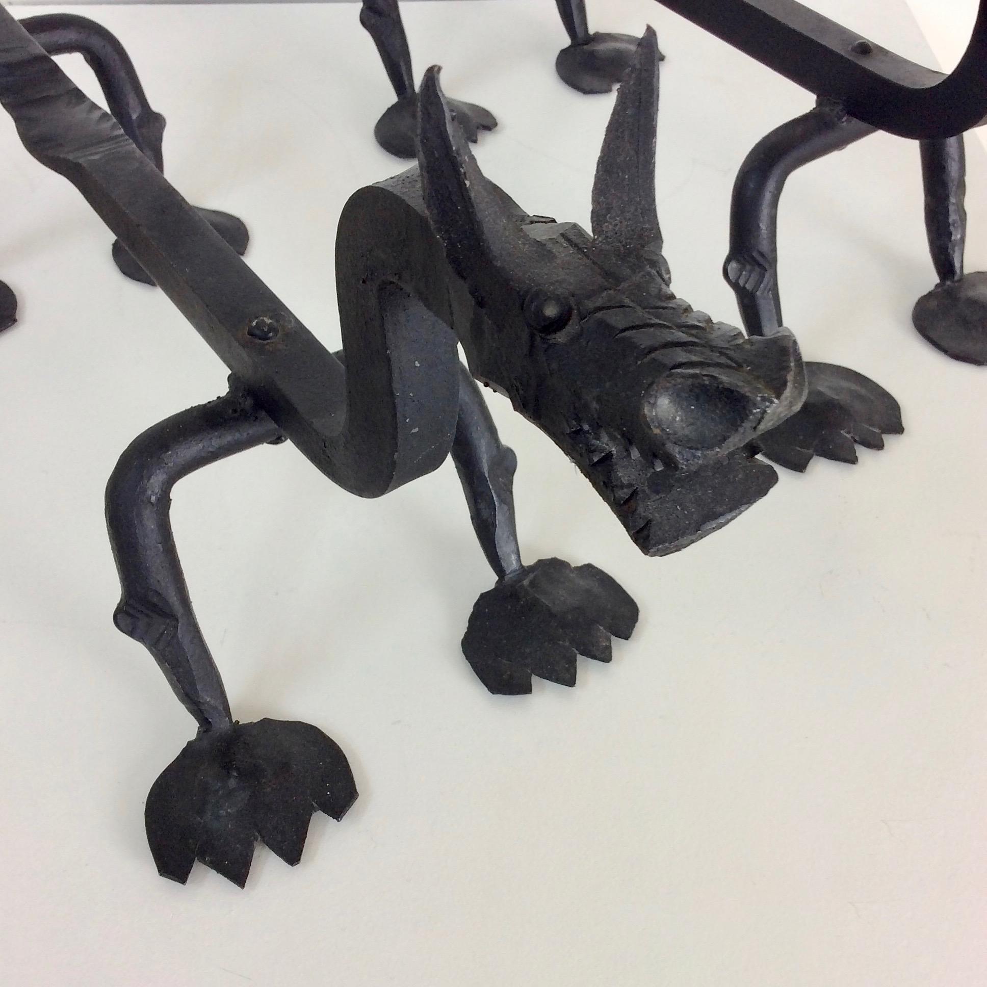 Sculptural Wrought Iron Pair Of Dragons Andirons, circa 1910. 1