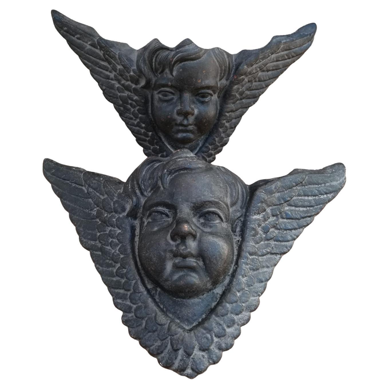 Paire de sculptures de têtes d'anges ailés en fonte pour mur Bon état - En vente à Benalmadena, ES