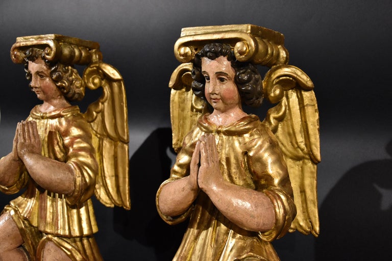 Pair Sculptures Winged Angels Wood Tuscany 17/18th Century Old master Gold Art  - Black Figurative Print by Pair of sculptures depicting two winged angels in carved wood