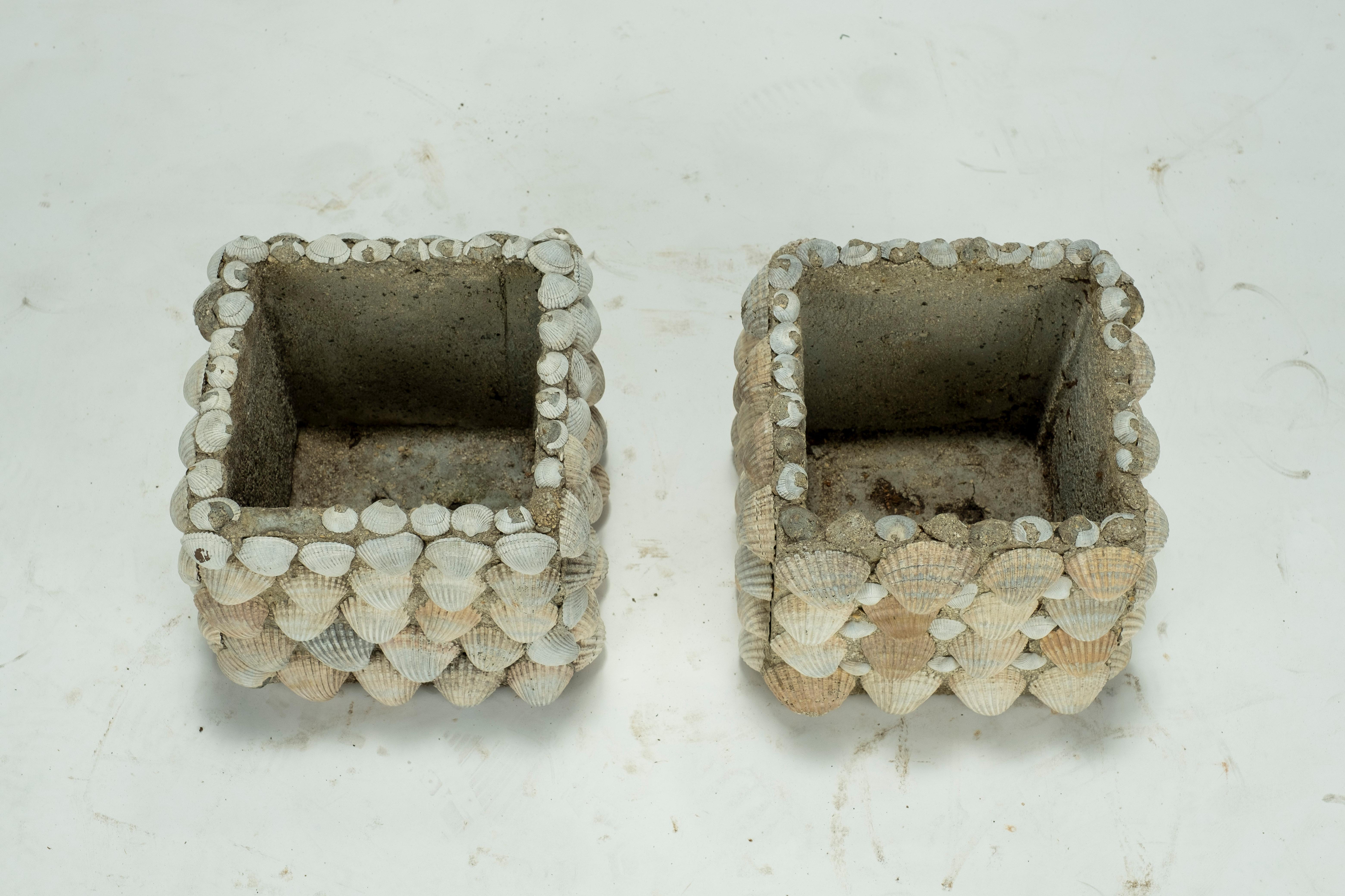 Pair of square Seashell planters adorned with shells from the Cliffs of Dover. A few of the shells have broken.