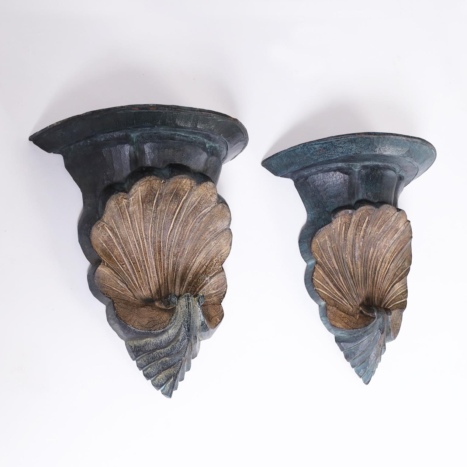 Pair of Anglo Indian seashell inspired wall brackets with classical form carved from indigenous hard wood and decorated with green and gold.