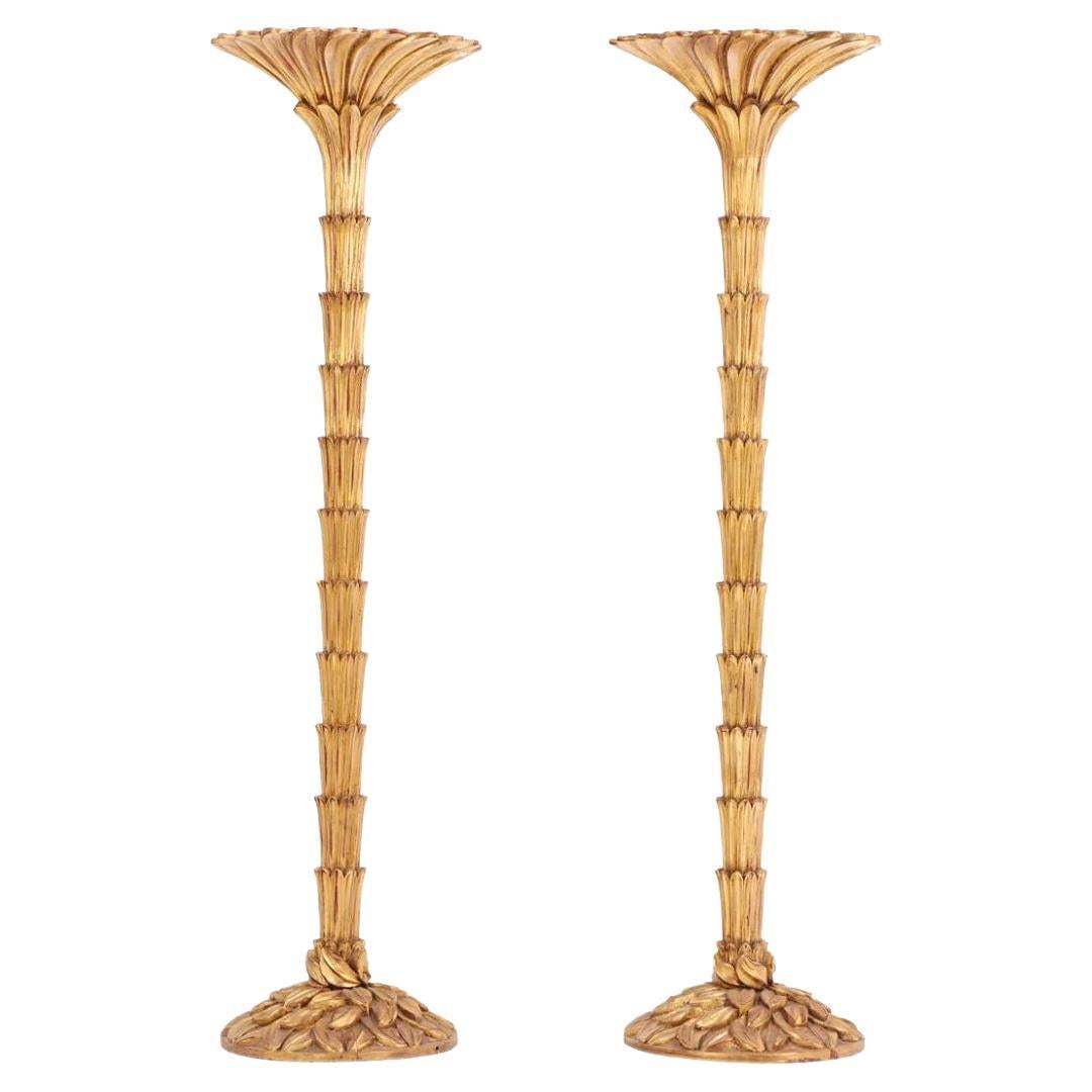 Pareja de antorchas de madera dorada estilo Serge Roche en venta