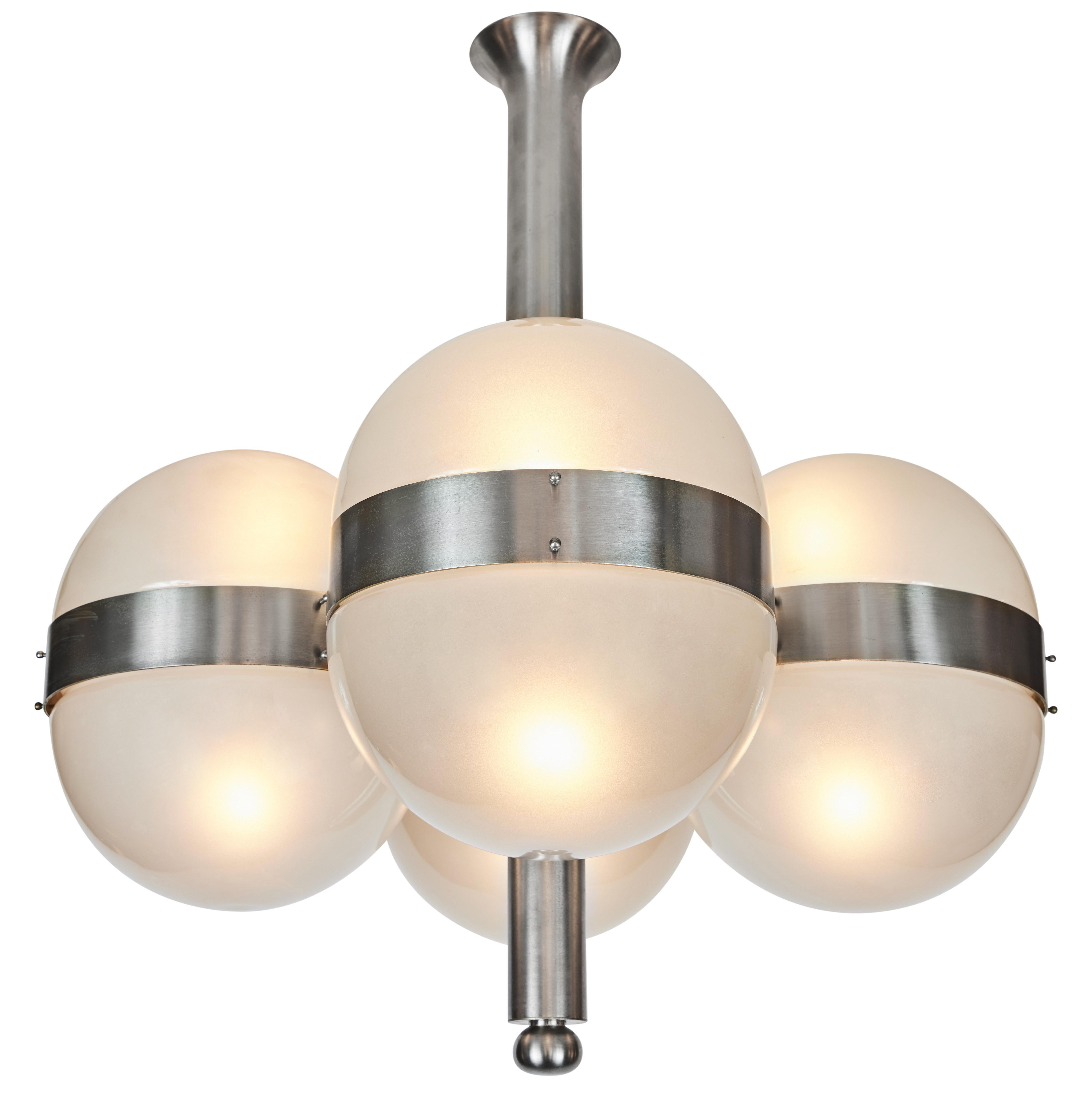 Pair of Sergio Mazza 'Tetraclio' Chandeliers for Artemide, 1960s. Designed in 1961 and executed in nickeled brass and pressed opaline glass Professionally rewired for US electrical. Accommodates 8x standard e26 60W max bulbs.

Price is for the pair.